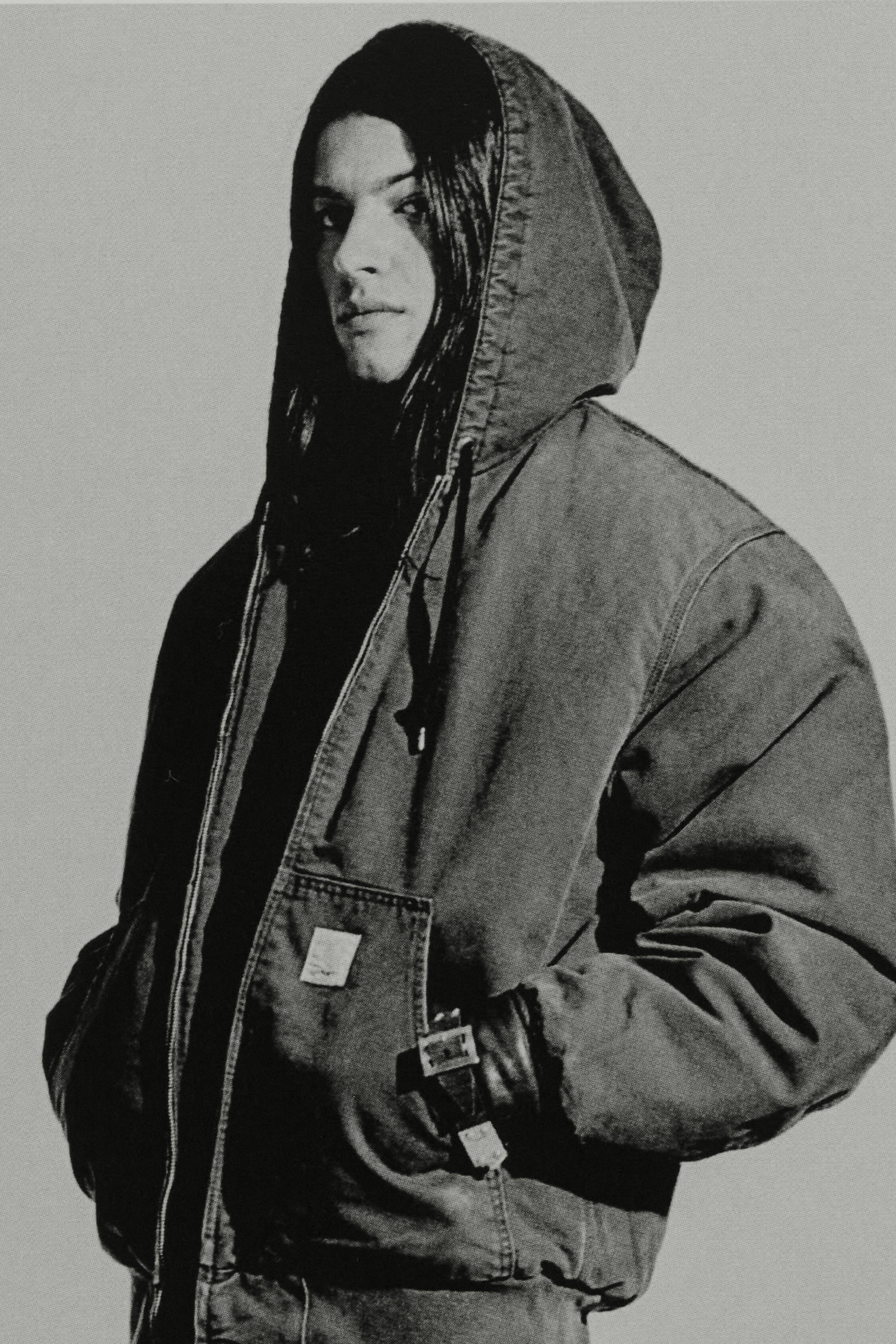 Model wearing an OG Active Jacket and a pair of Double Knee Pants