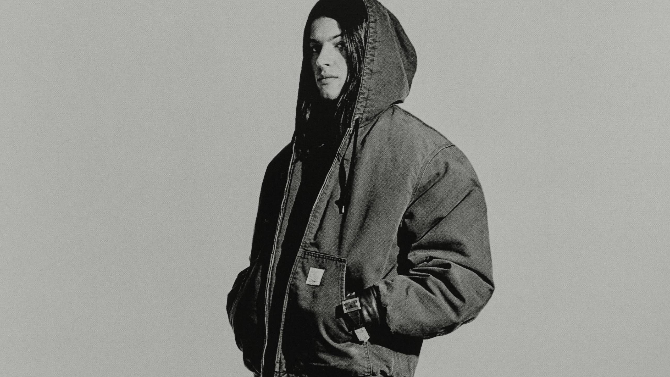 Model wearing an OG Active Jacket and a pair of Double Knee Pants