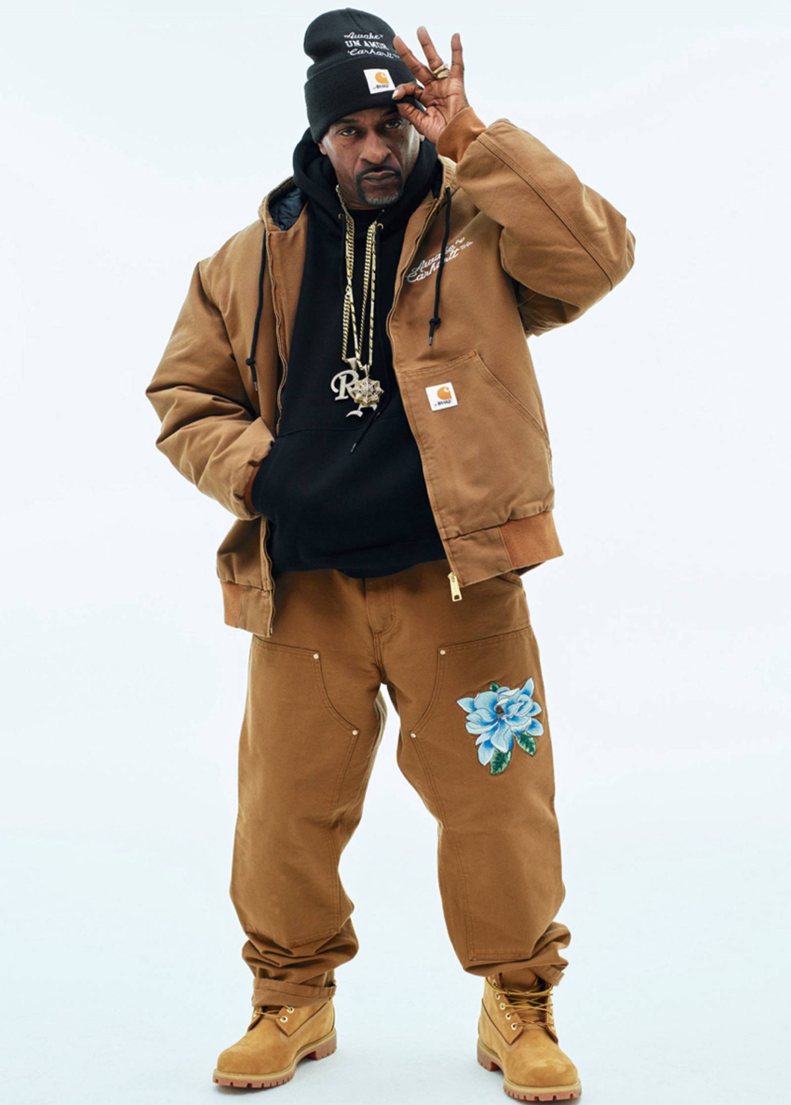 Model wearing Carhartt WIP x Awake NY OG Active Jacket in Hamilton Brown
