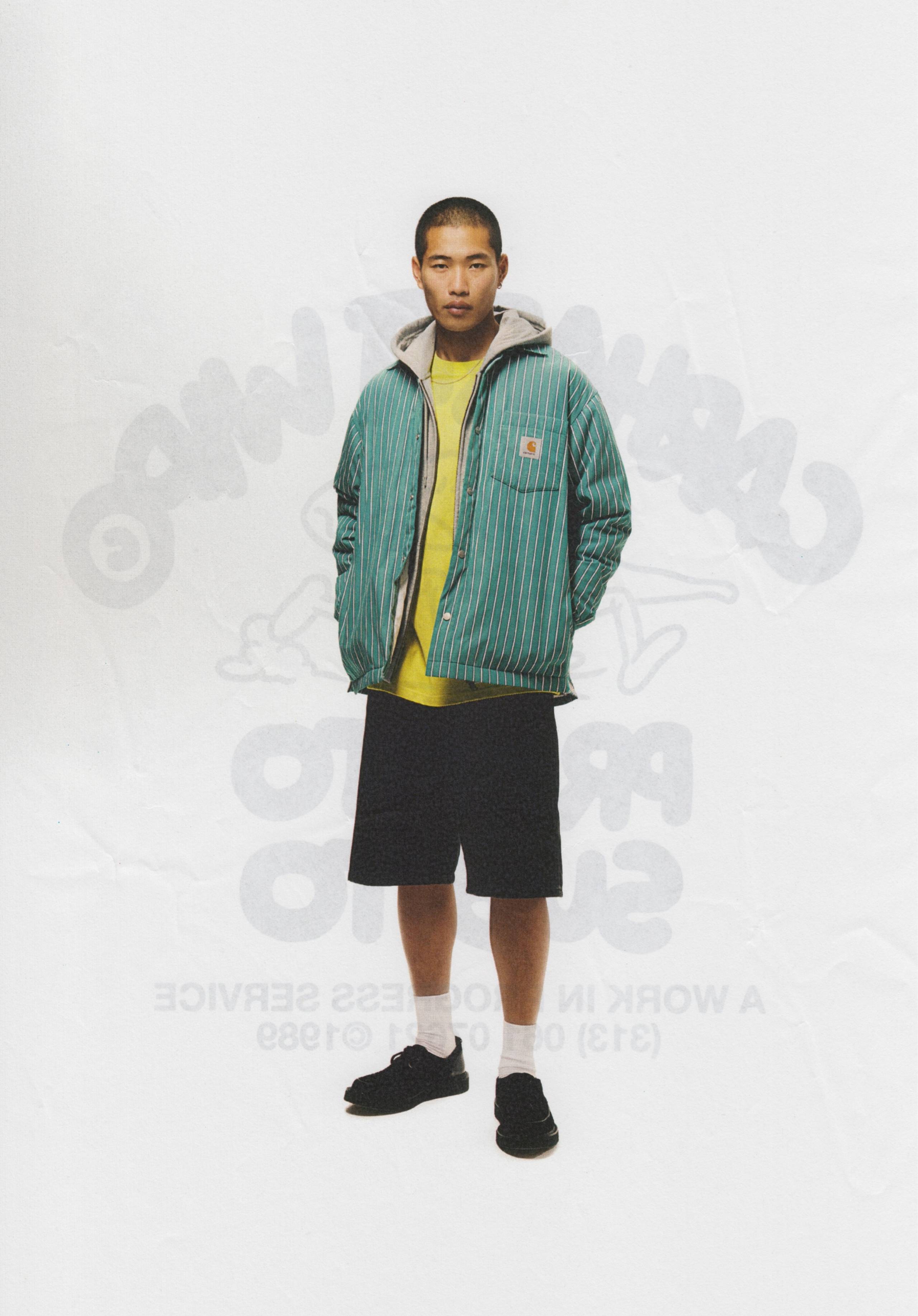 Model wearing Carhartt WIP Grimsby shirt jacket in green
