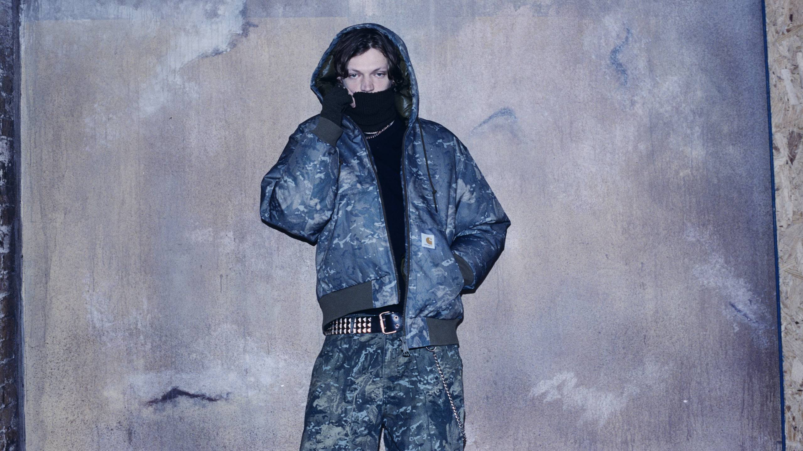 Model wearing a full Camo Combi look from the In Plain Sight Collection