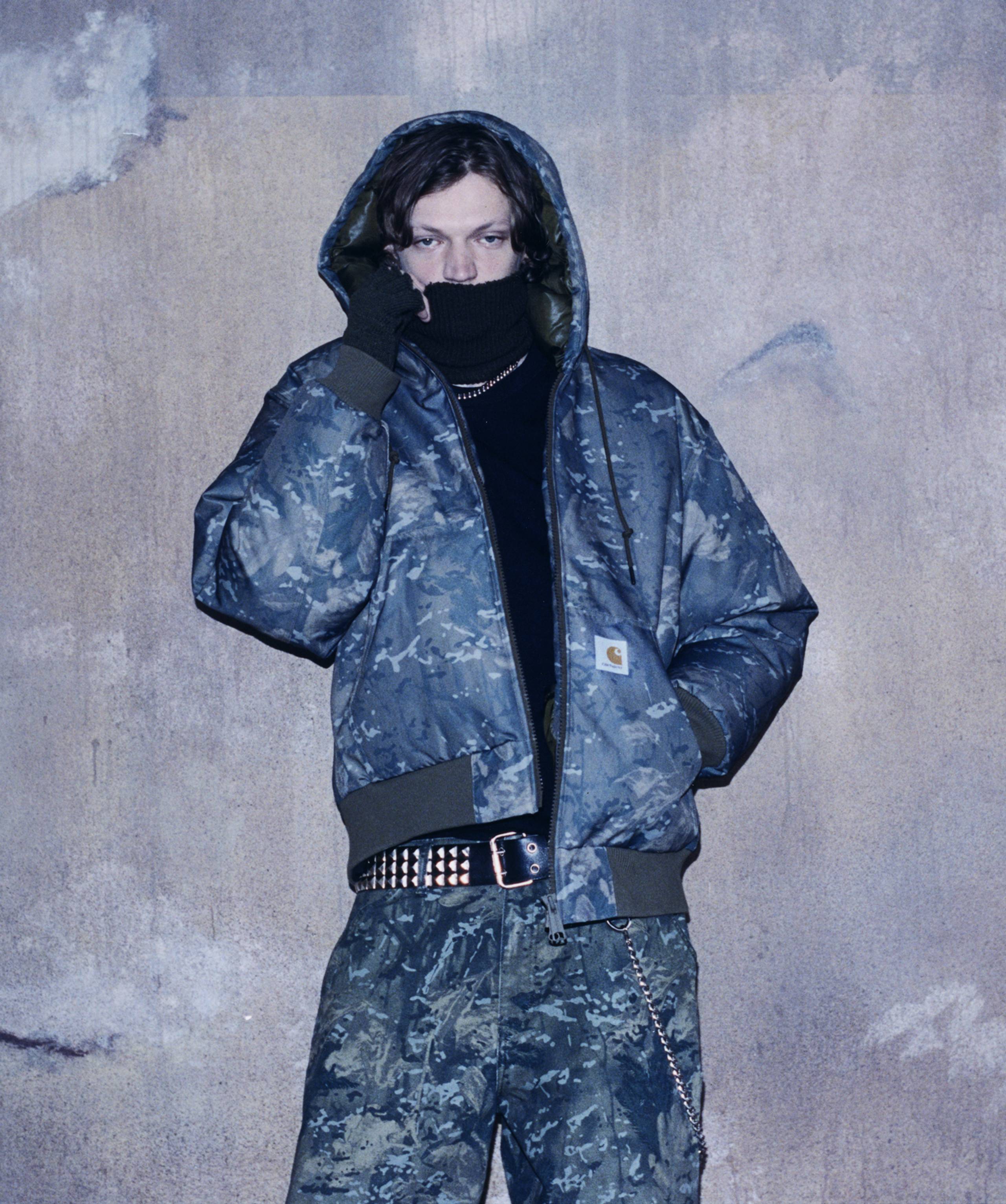 Model wearing a full Camo Combi look from the In Plain Sight Collection