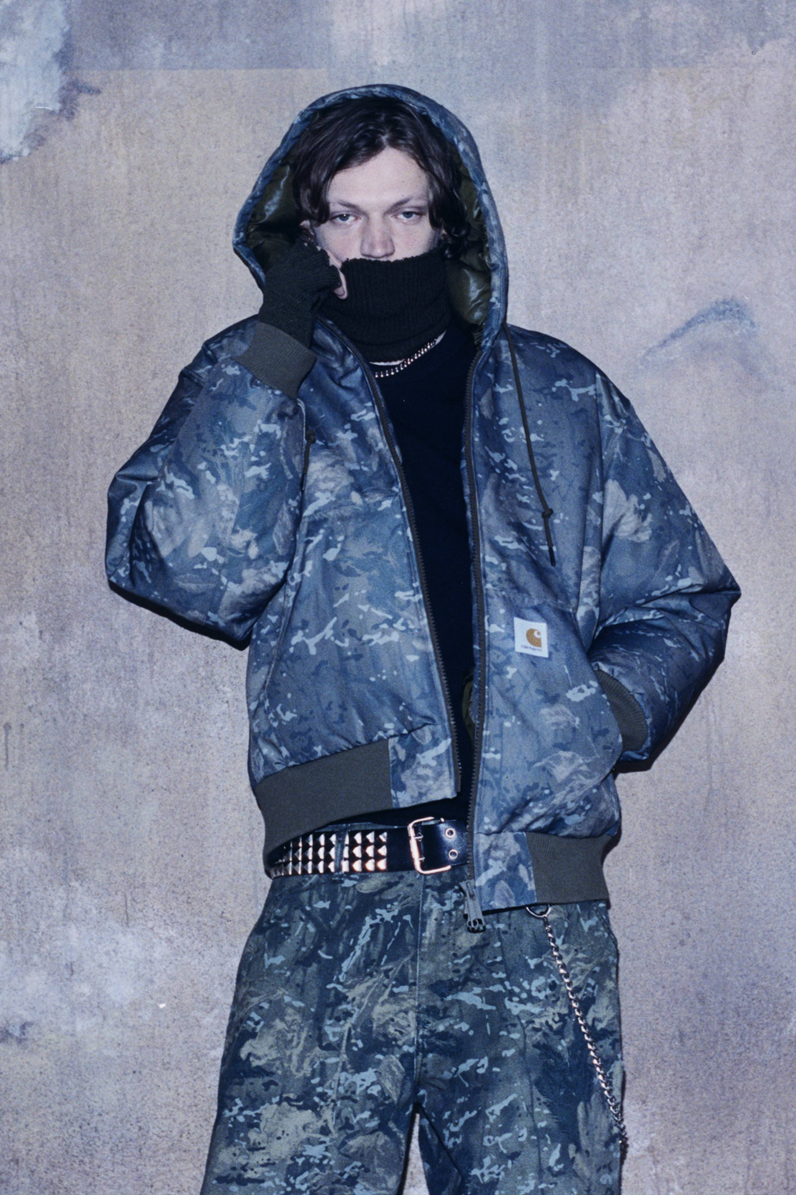 Model wearing a full Camo Combi look from the In Plain Sight Collection