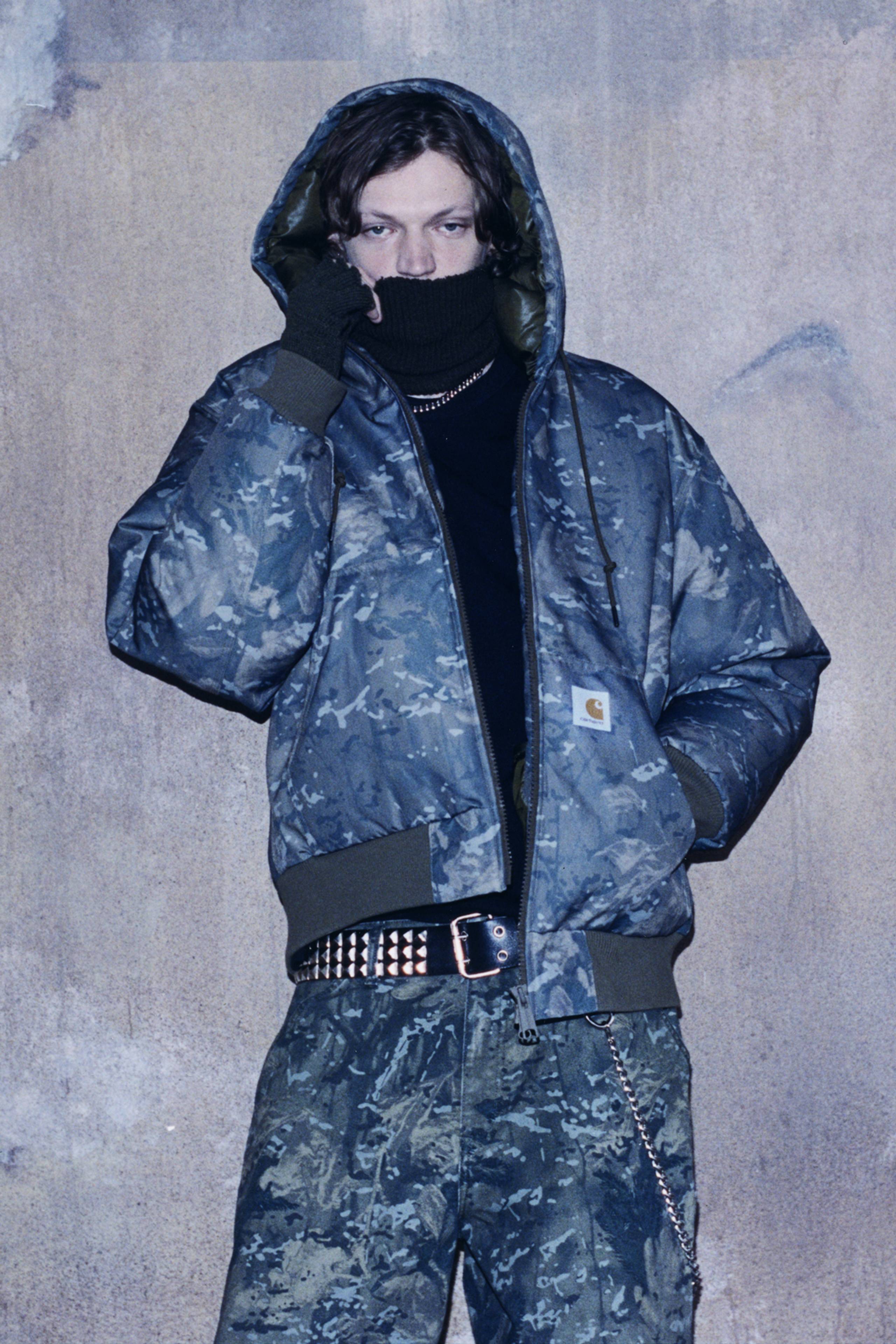 Model wearing a full Camo Combi look from the In Plain Sight Collection