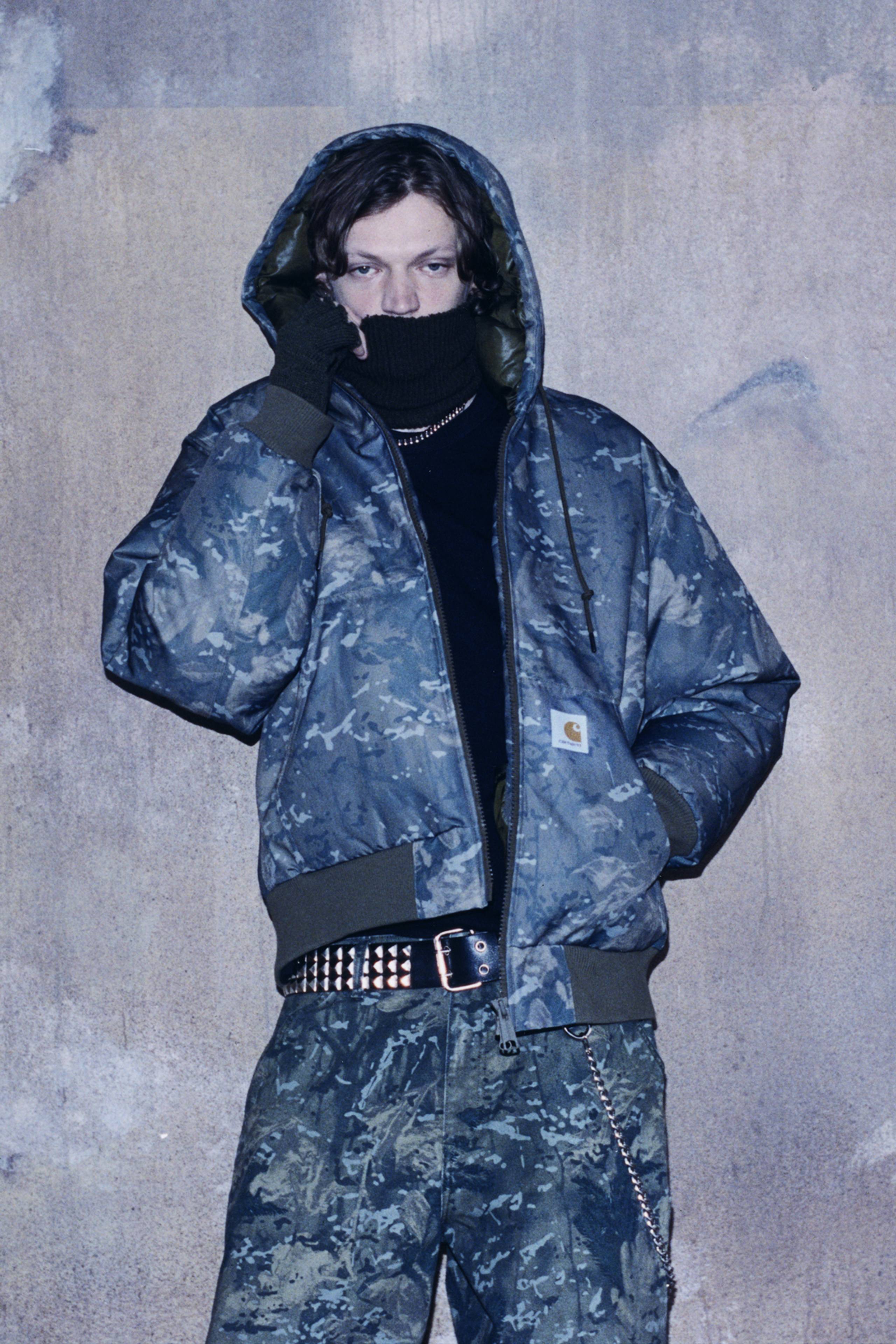 Model wearing a full Camo Combi look from the In Plain Sight Collection