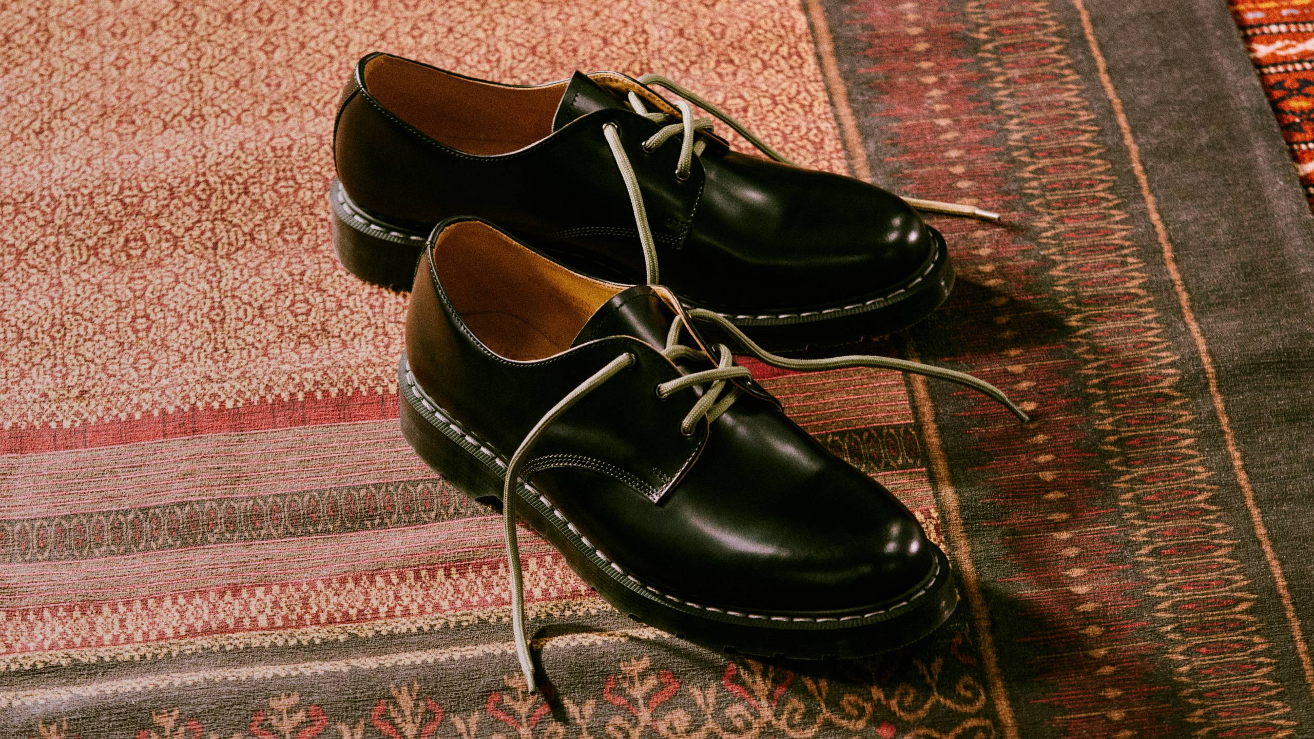 A pair Solovair x Carhartt WIP Collaboration Derby shoes in Black