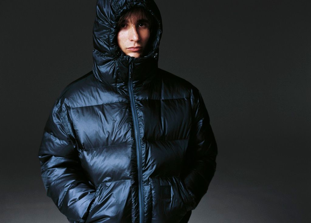 Model wearing a Lucid Jacket in Charcoal Grey