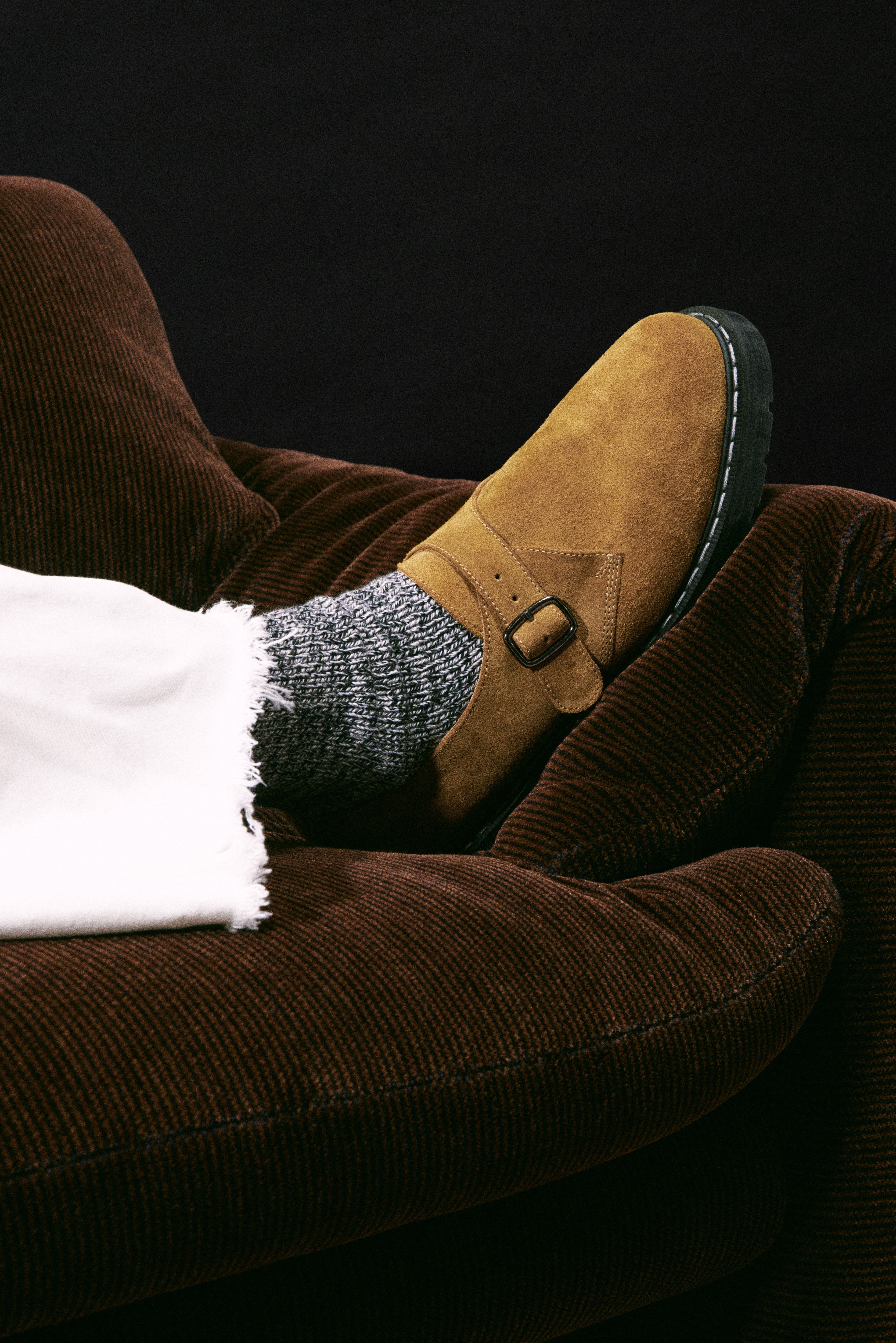 Model wearing a pair of the Solovair x Carhartt WIP Collaboration Monk Strap Derbies