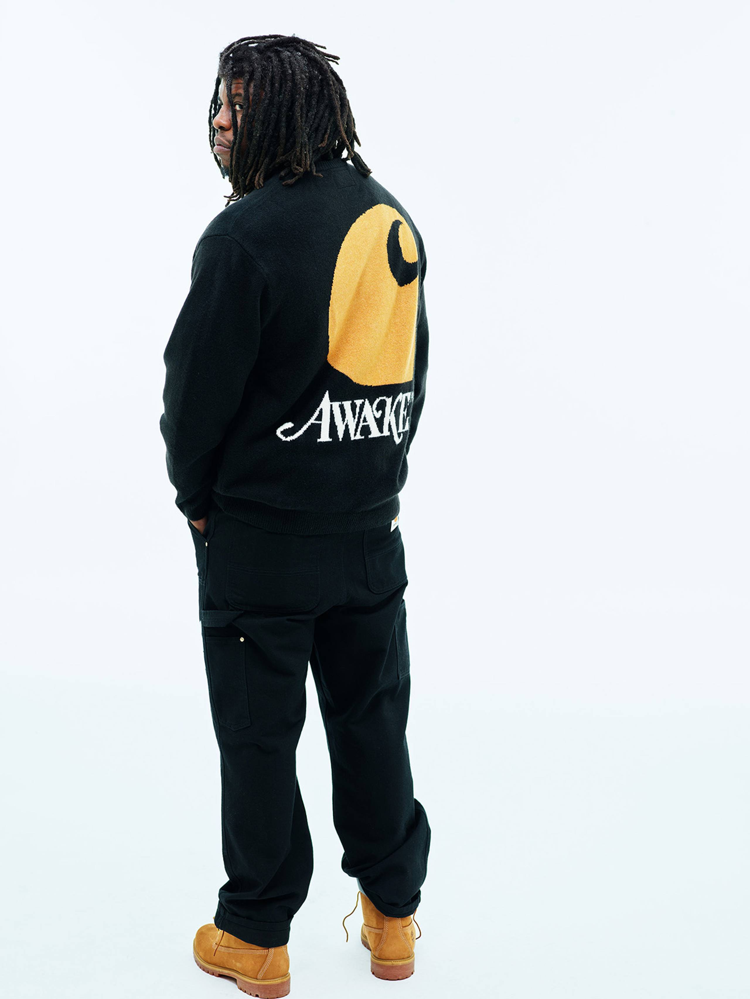 Model wearing Carhartt WIP x Awake NY sweater