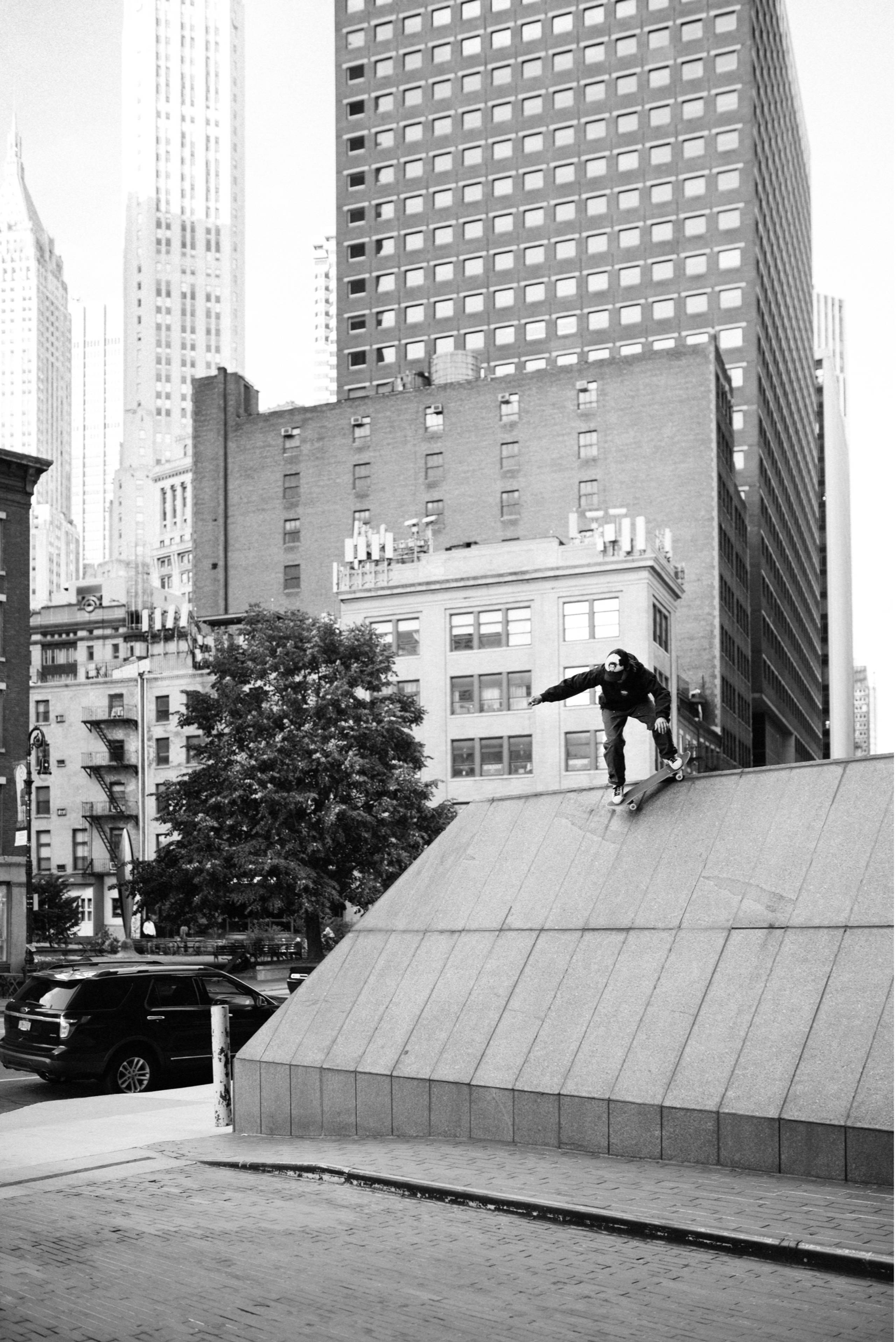 Skater Eddie Cernicky doing a switch roll in Carhartt WIP Precious Skate Shoot