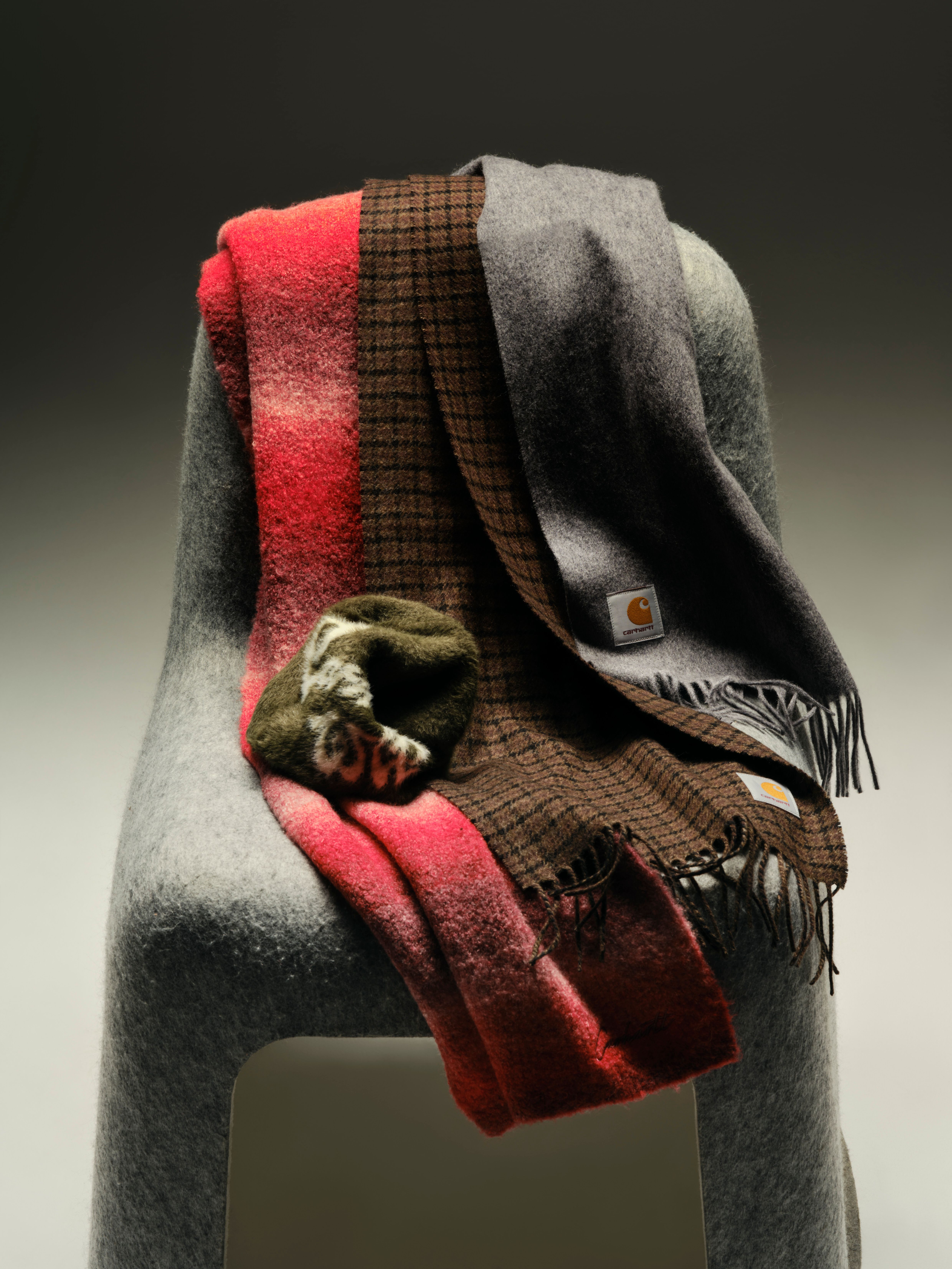Carhartt WIP Scarves laying on a chair