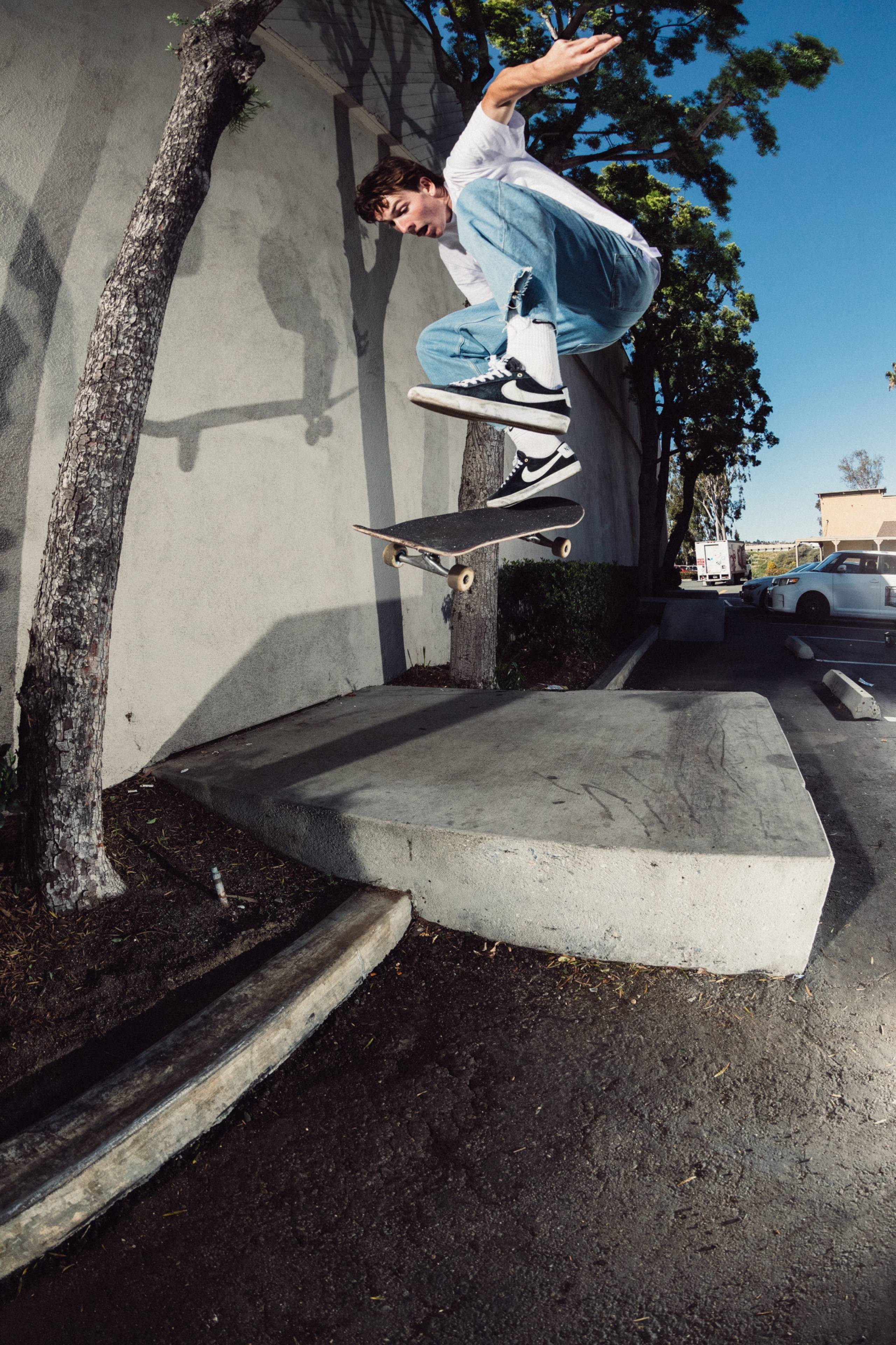 Skater Riley Pavey doing a kickflip to 50/50 in Carhartt WIP Precious Skate film