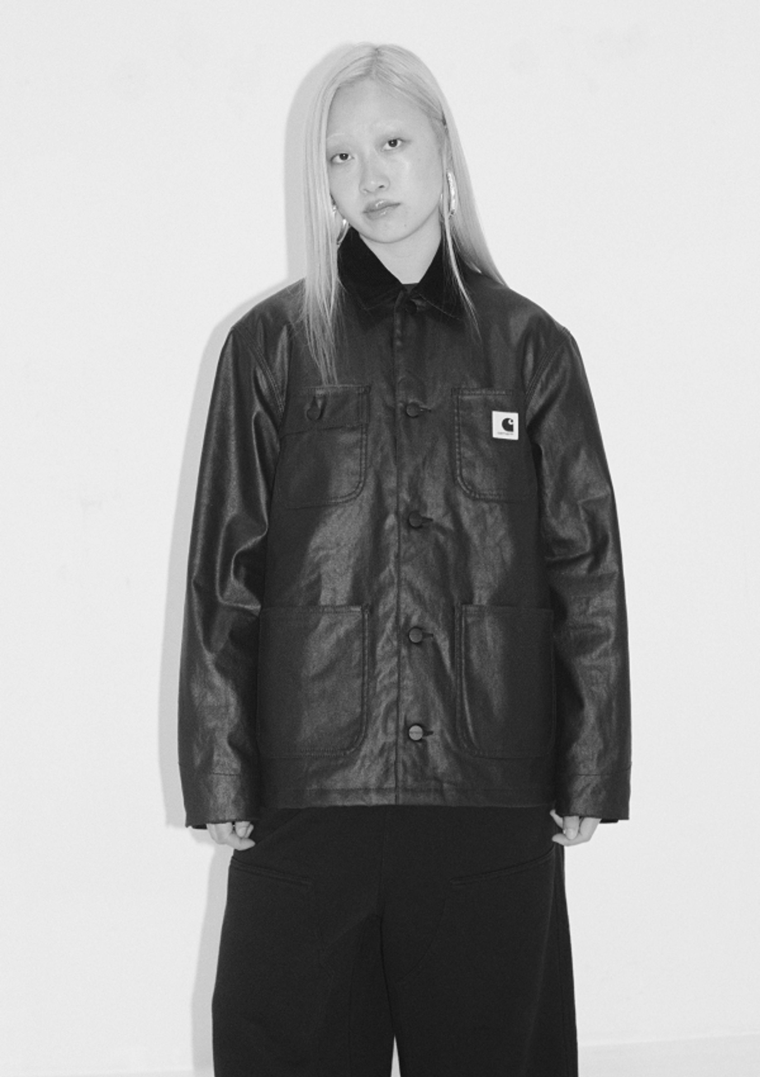 Model wearing a Women’s Dean Michigan Jacket in Black
