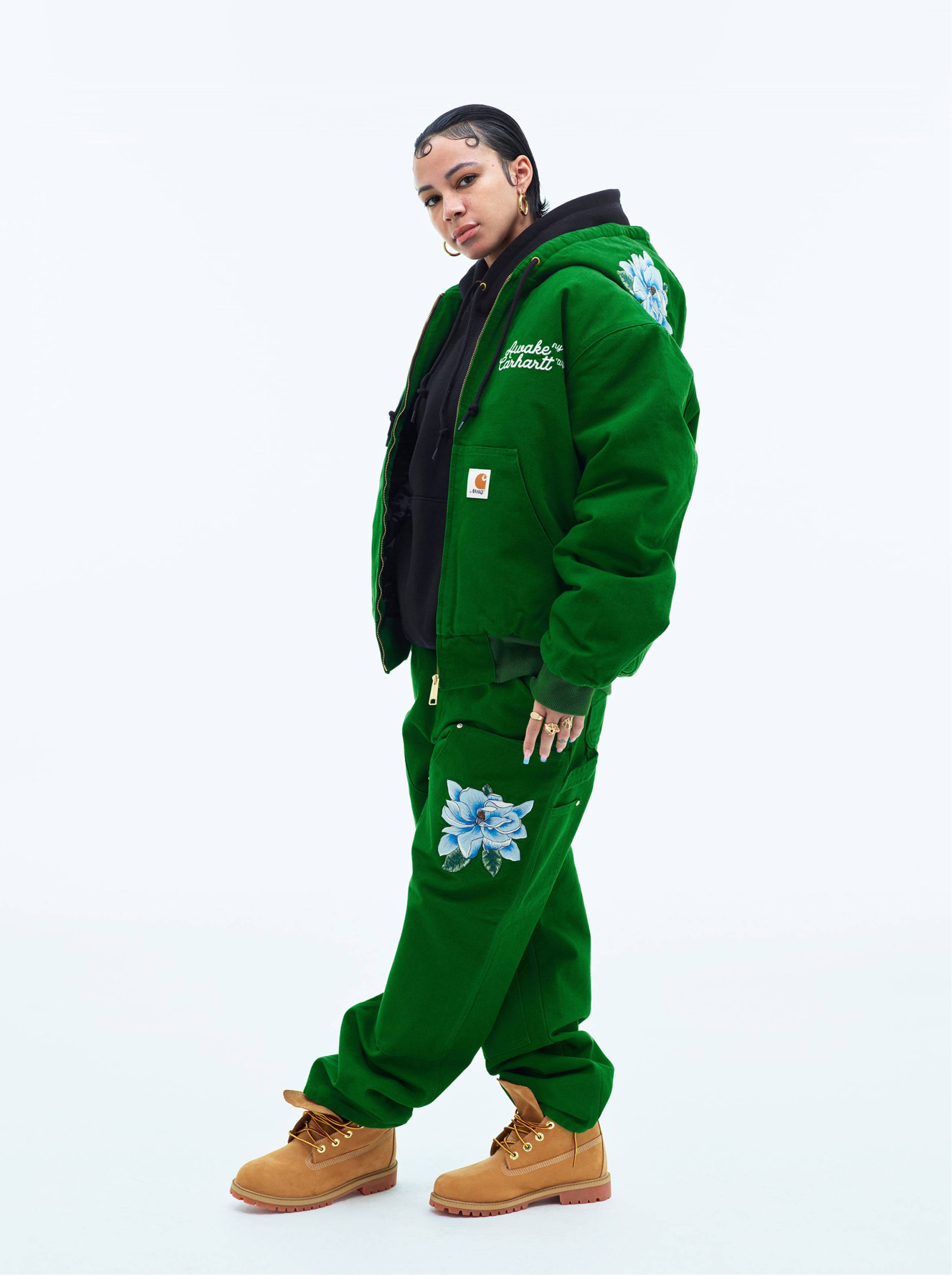 Model wearing Carhartt WIP x Awake NY OG Active Jacket in Green