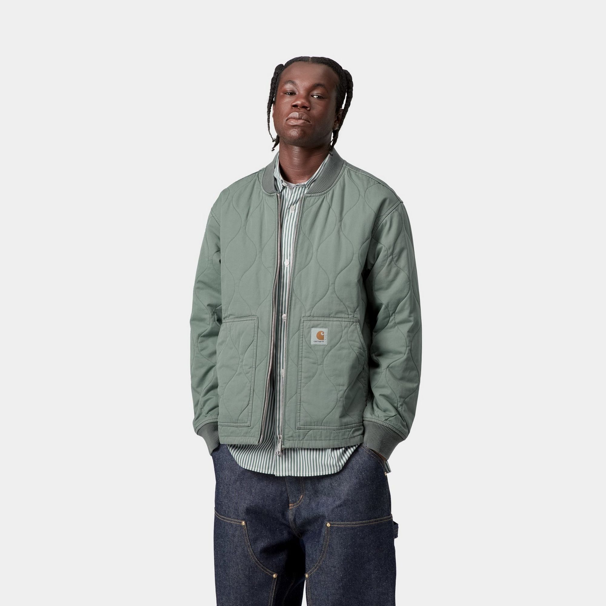 Model wearing a Kylan Liner in Green