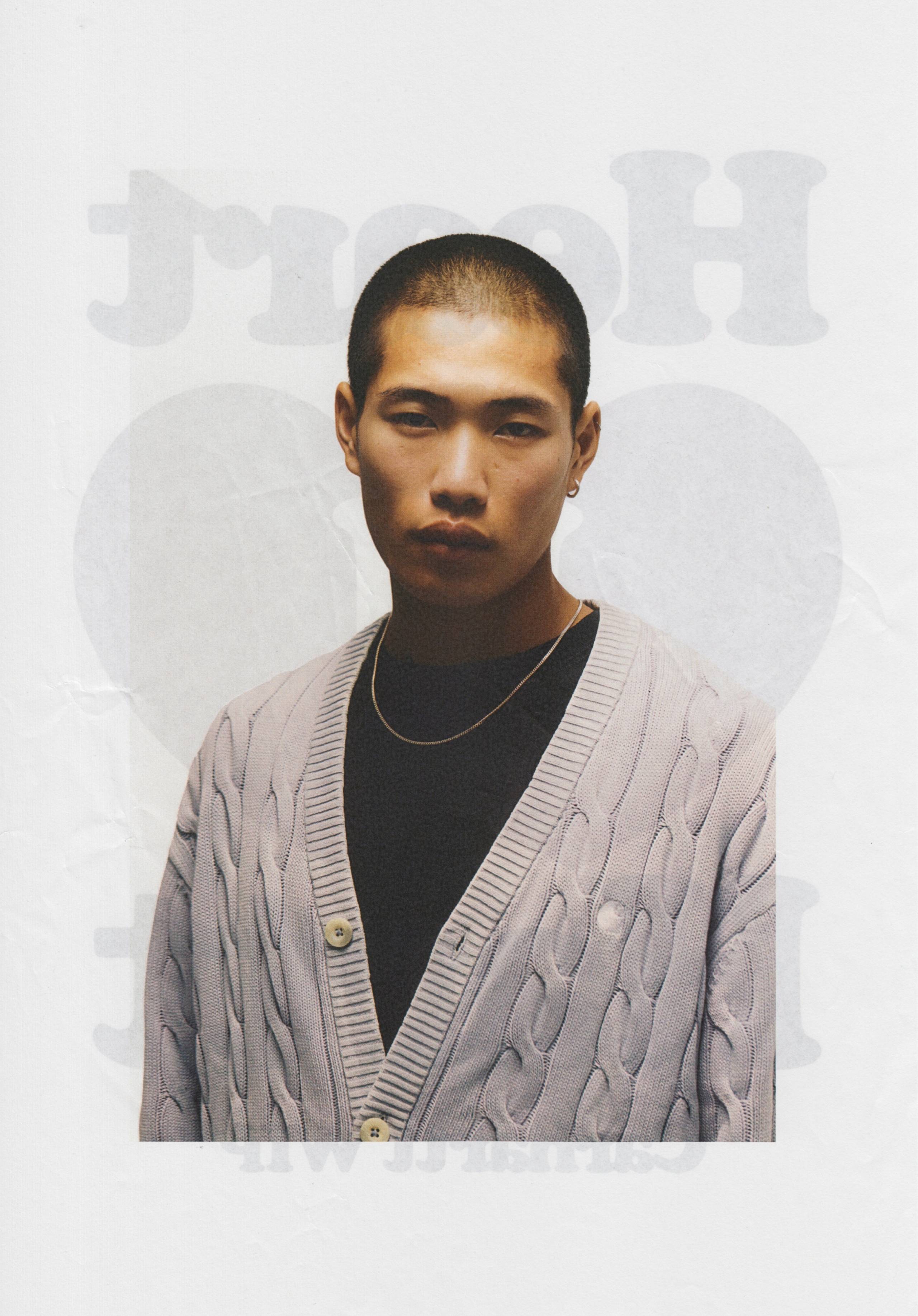 Model wearing Carhartt WIP Carter Cardigan in Blue Fog