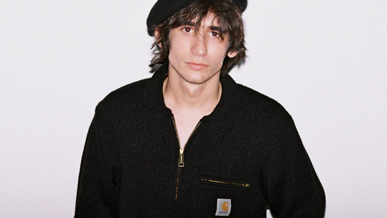 Model wearing a beret and a Detroit Sweater in F/W25 Store Exclusives shoot