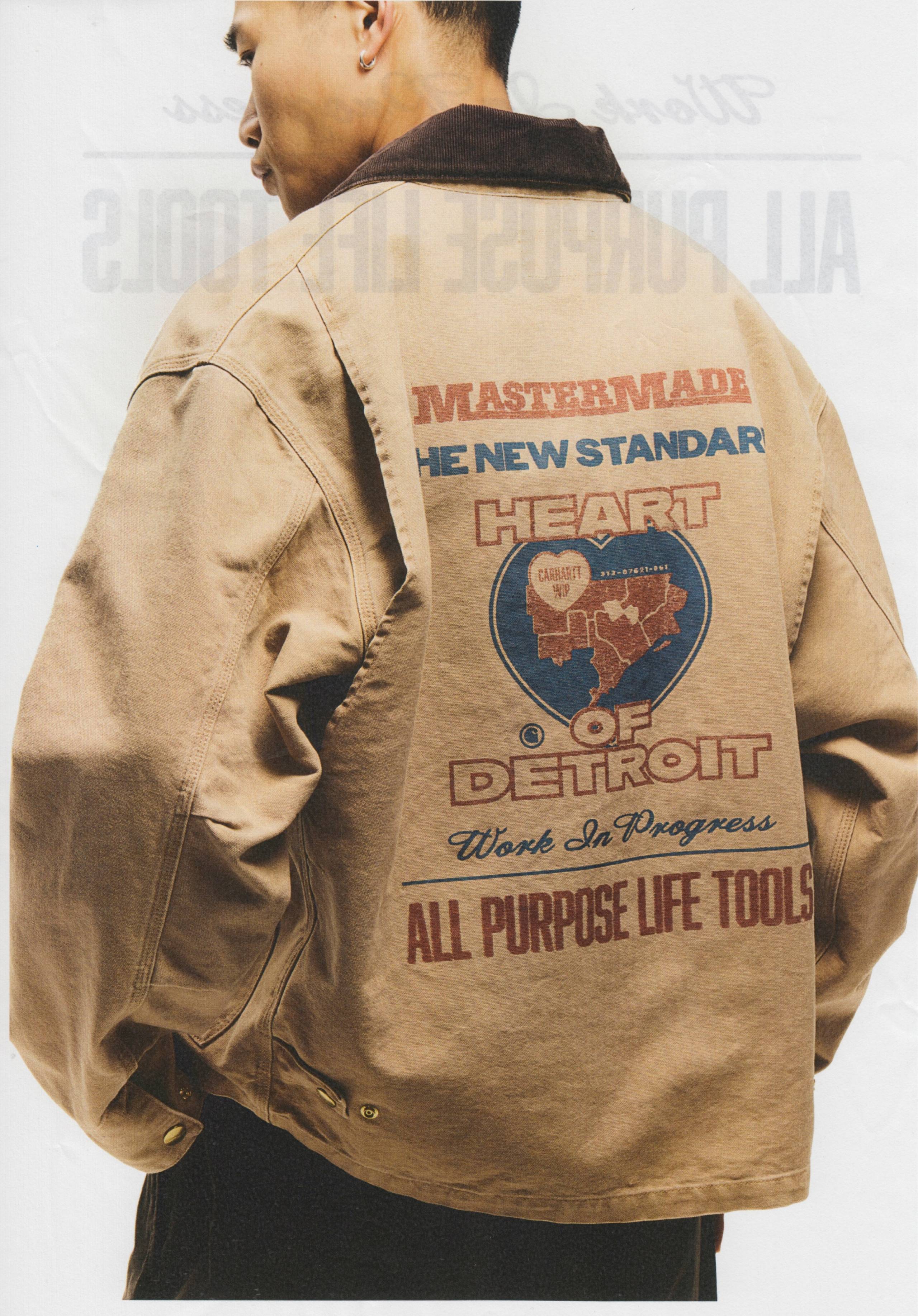 Model wearing Carhartt WIP Arcan Jacket in Dusty Hamilton Brown