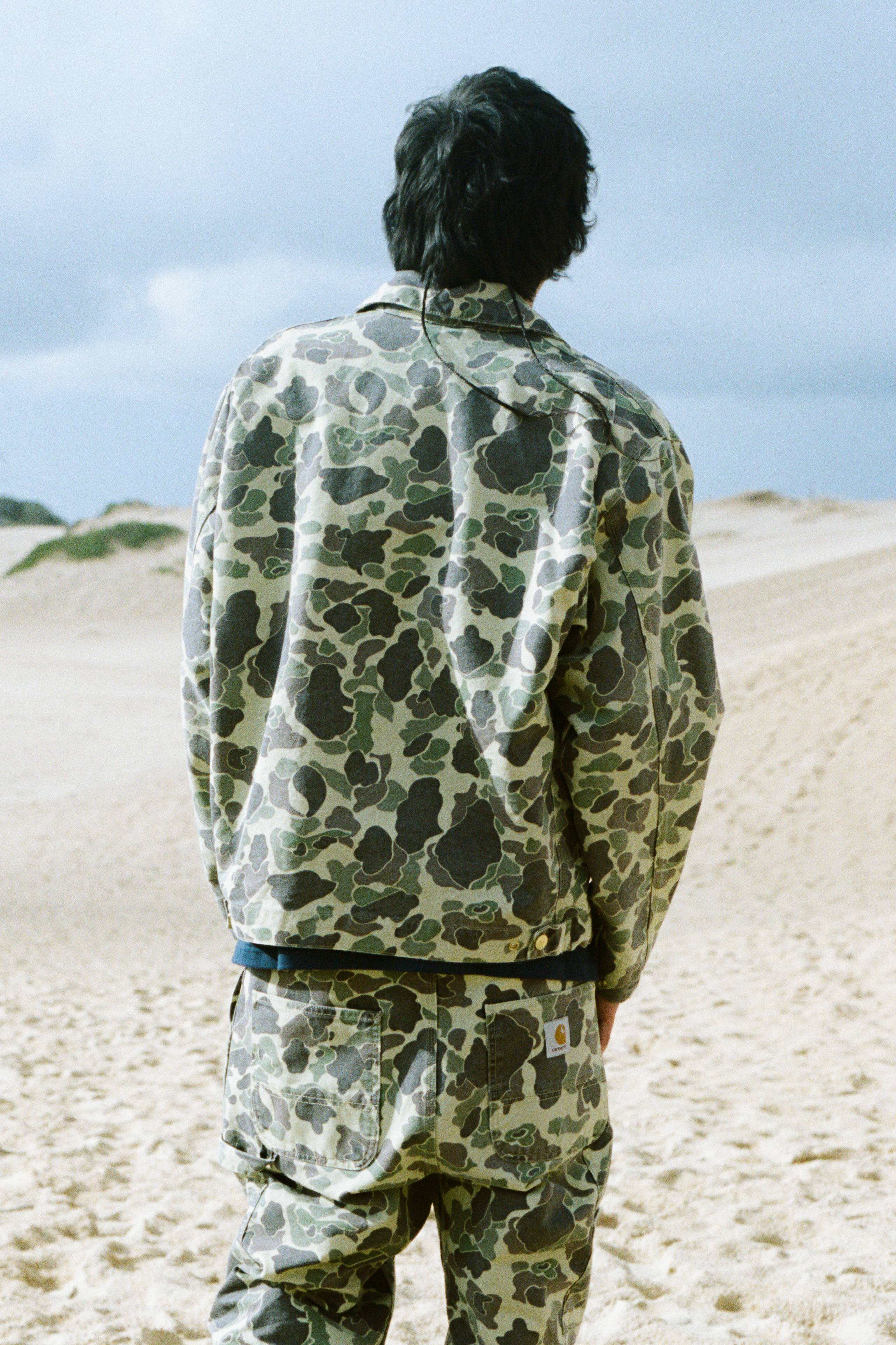 Model wearing a full duck camo look