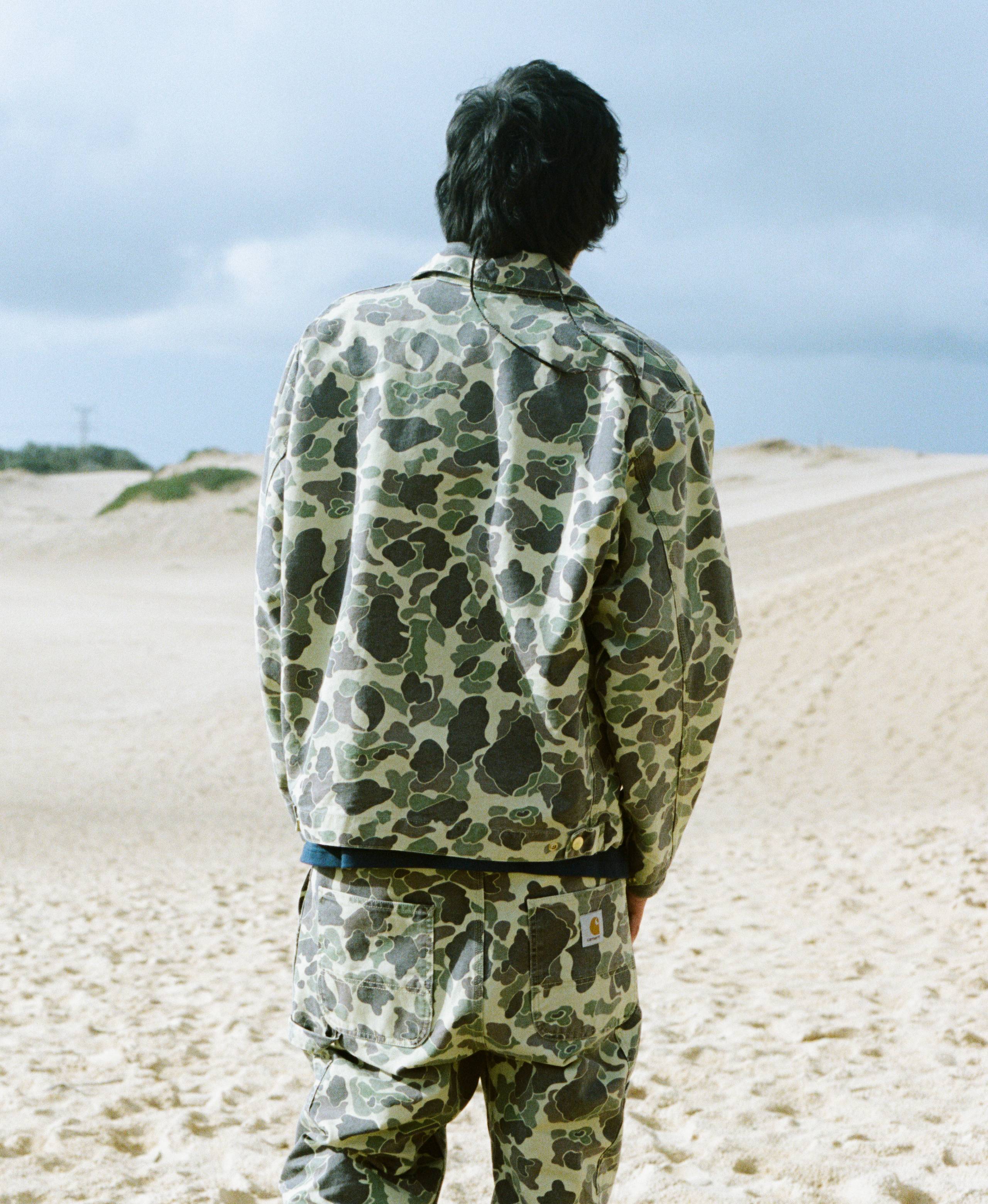 Model wearing a full duck camo look