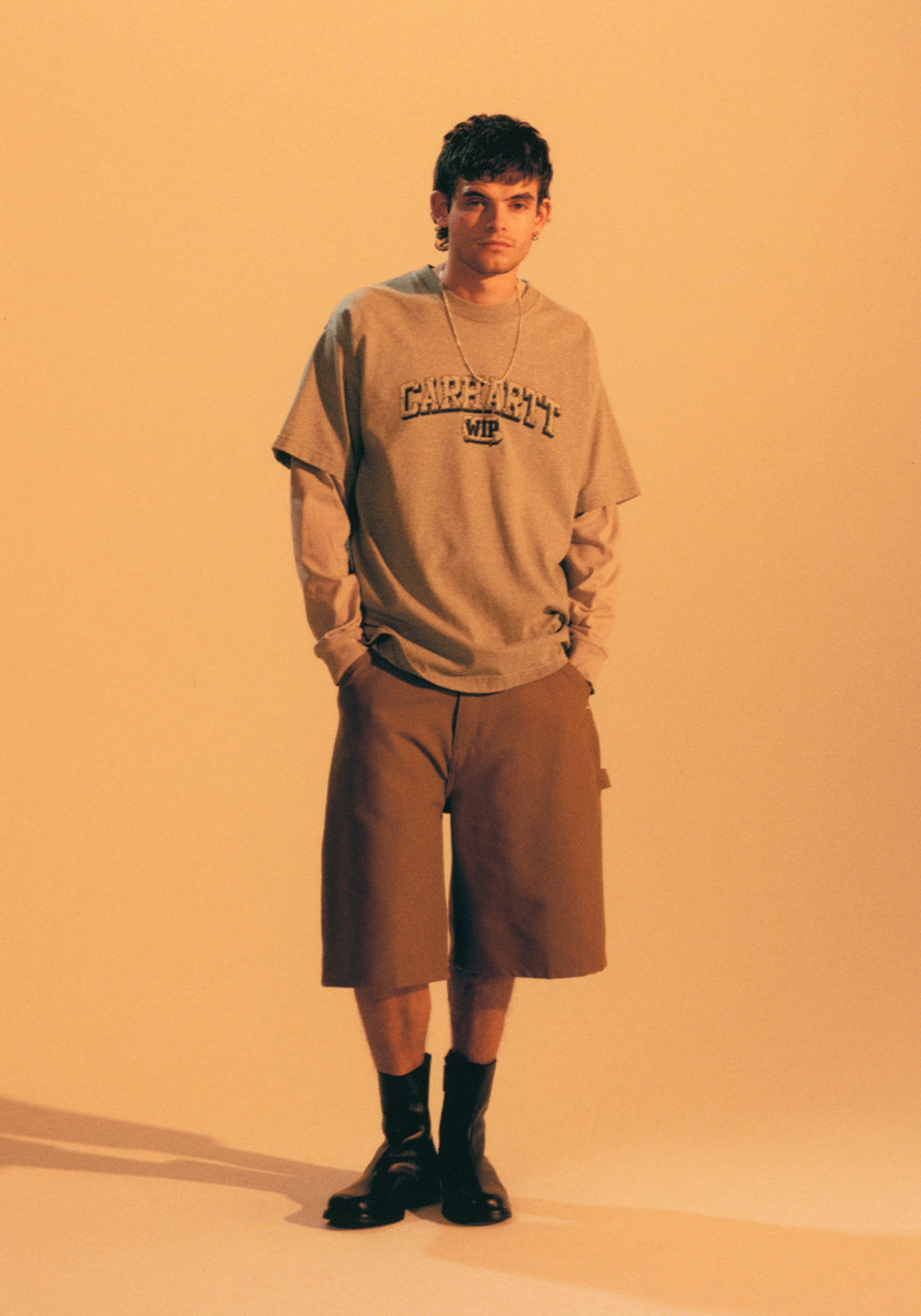 Model wearing items from the SS26 Pre Collection