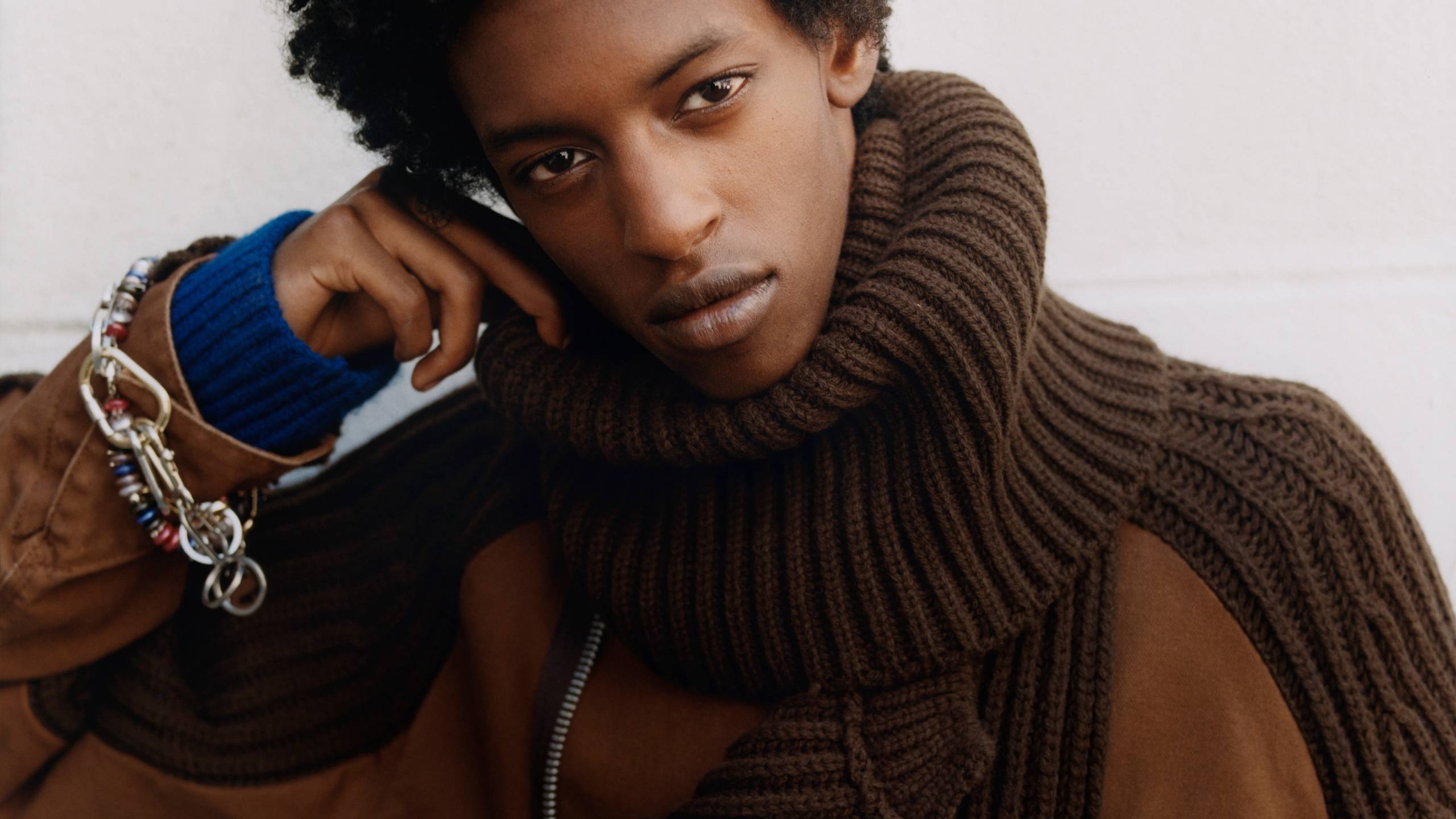 Model wearing a sacai x Carhartt WIP Washed Duck x Wool Knit Blouson