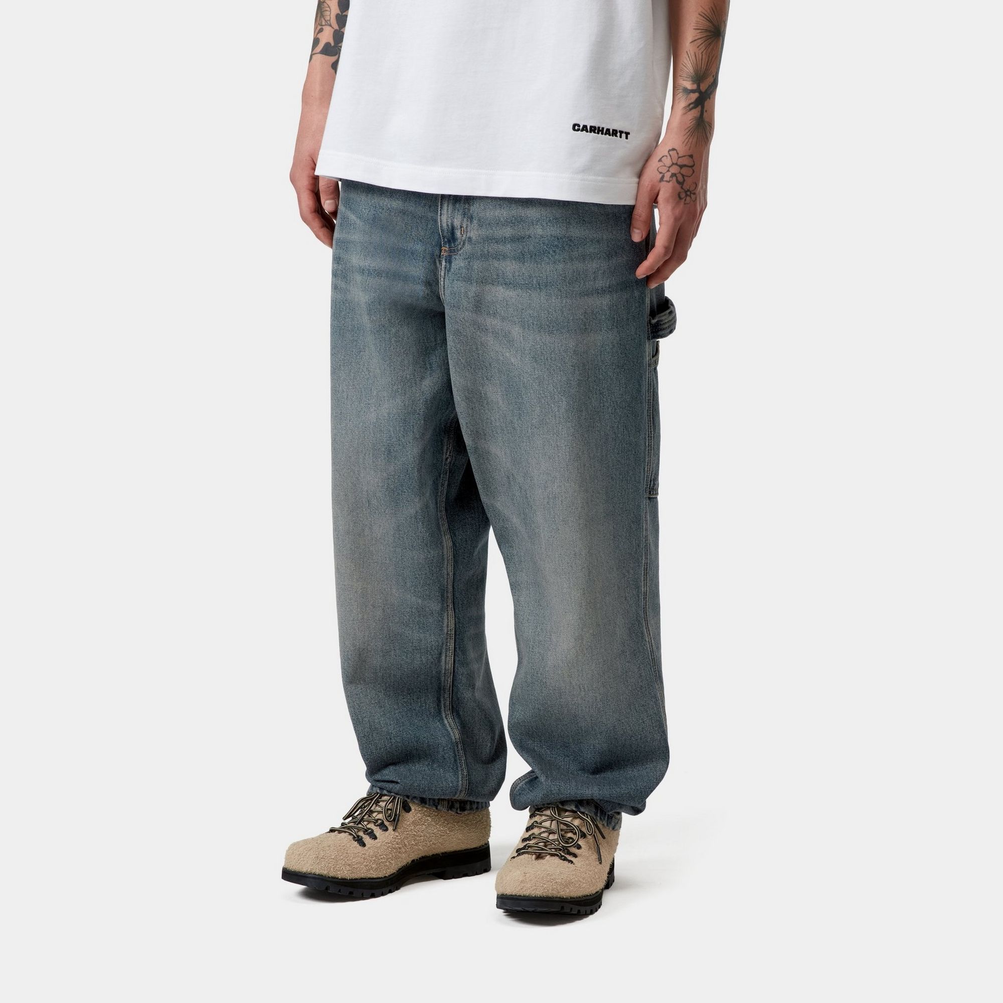 Model wearing a Single Knee Pant - Denim