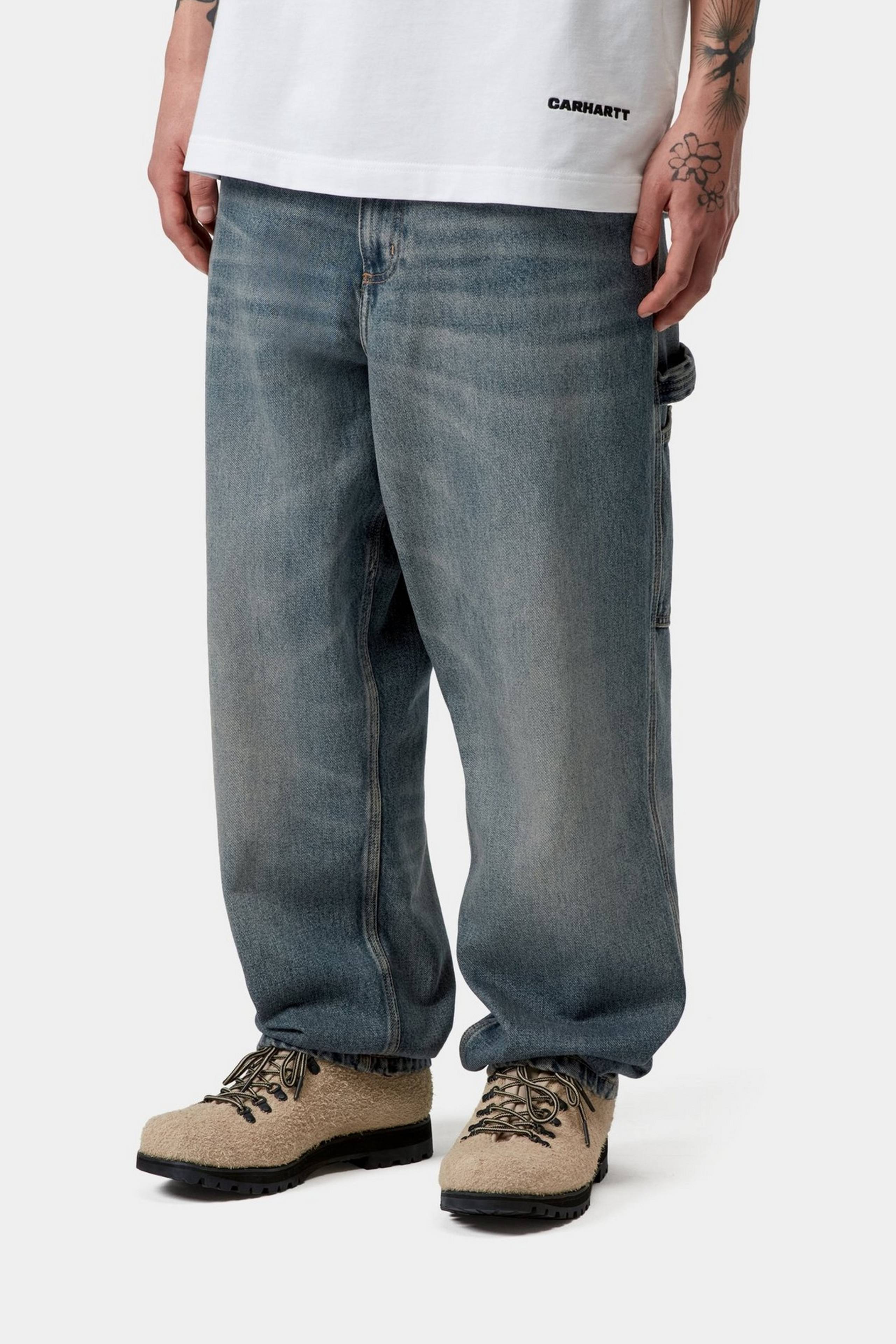 Model wearing a Single Knee Pant - Denim