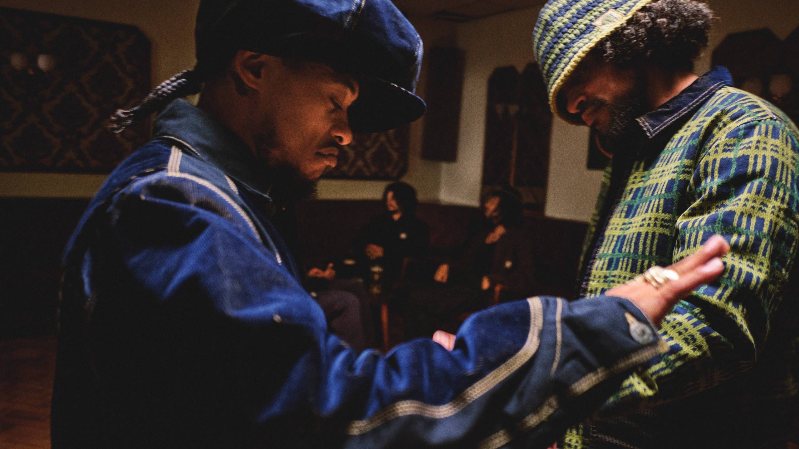 Close up of Models dancing while wearing items from the Nicholas Daley x Carhartt WIP Collaboration