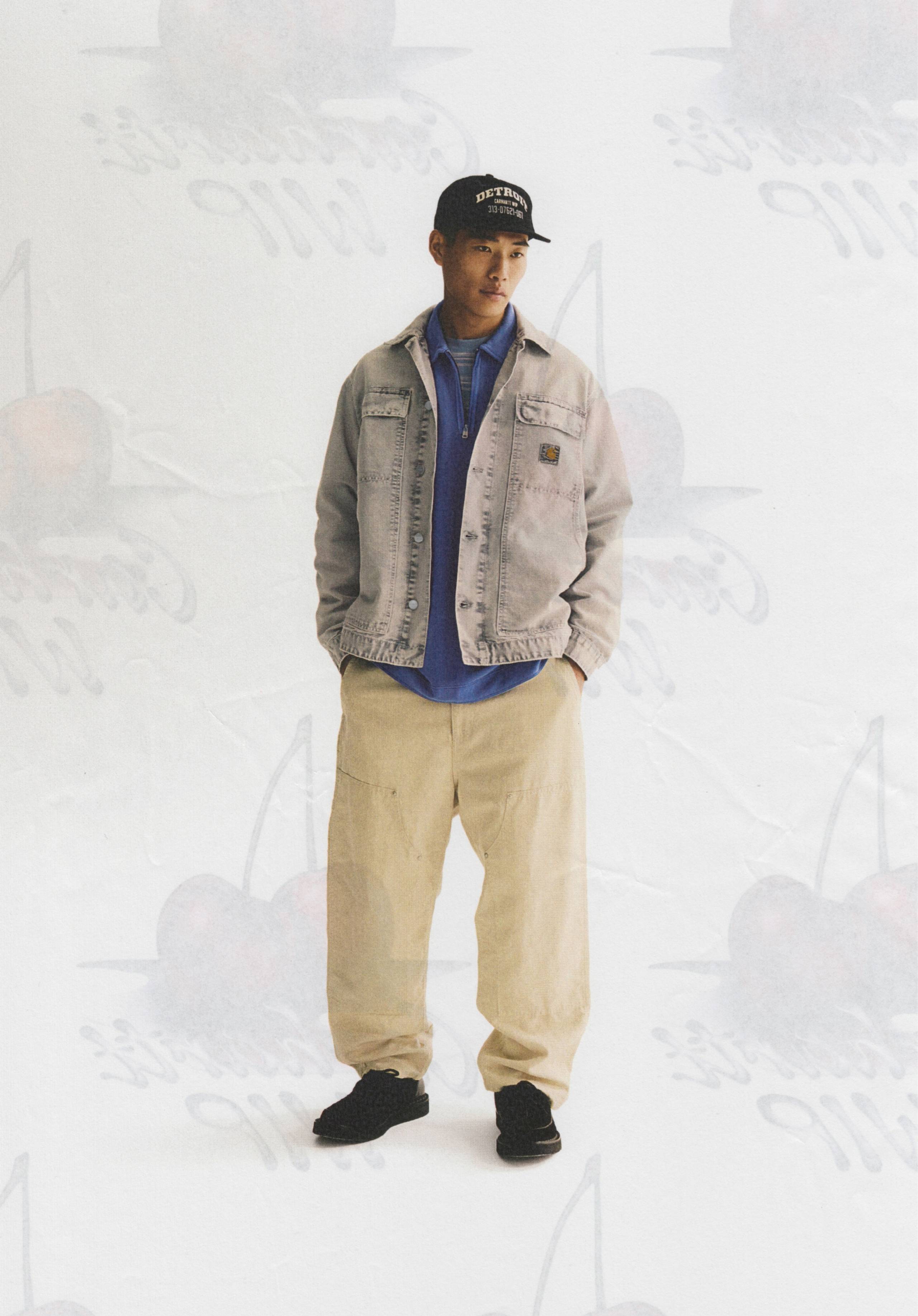 Model wearing Carhartt WIP OG Arctic Jacket in black Chalk Wash