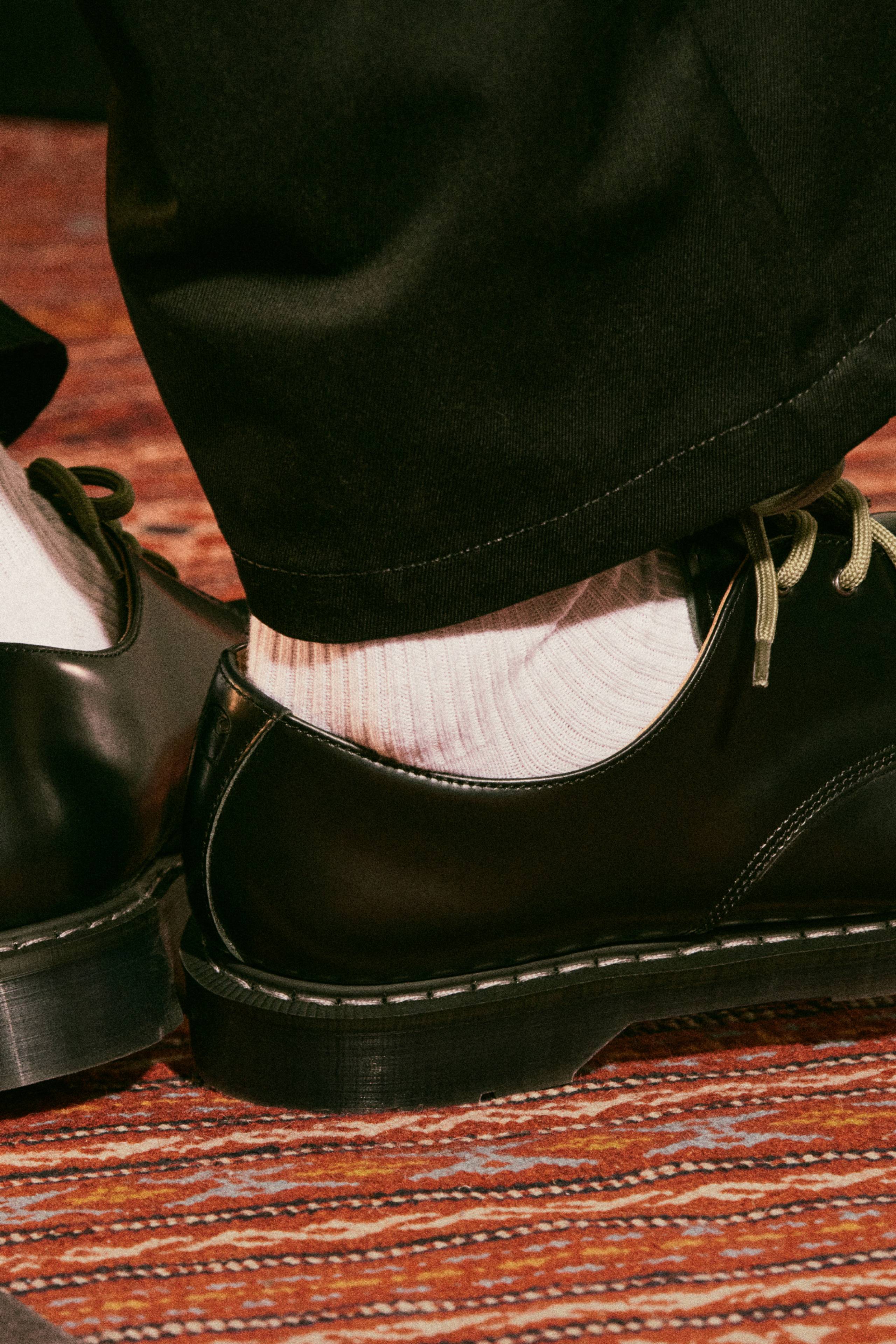 A pair Solovair x Carhartt WIP Collaboration Derby shoes in Black