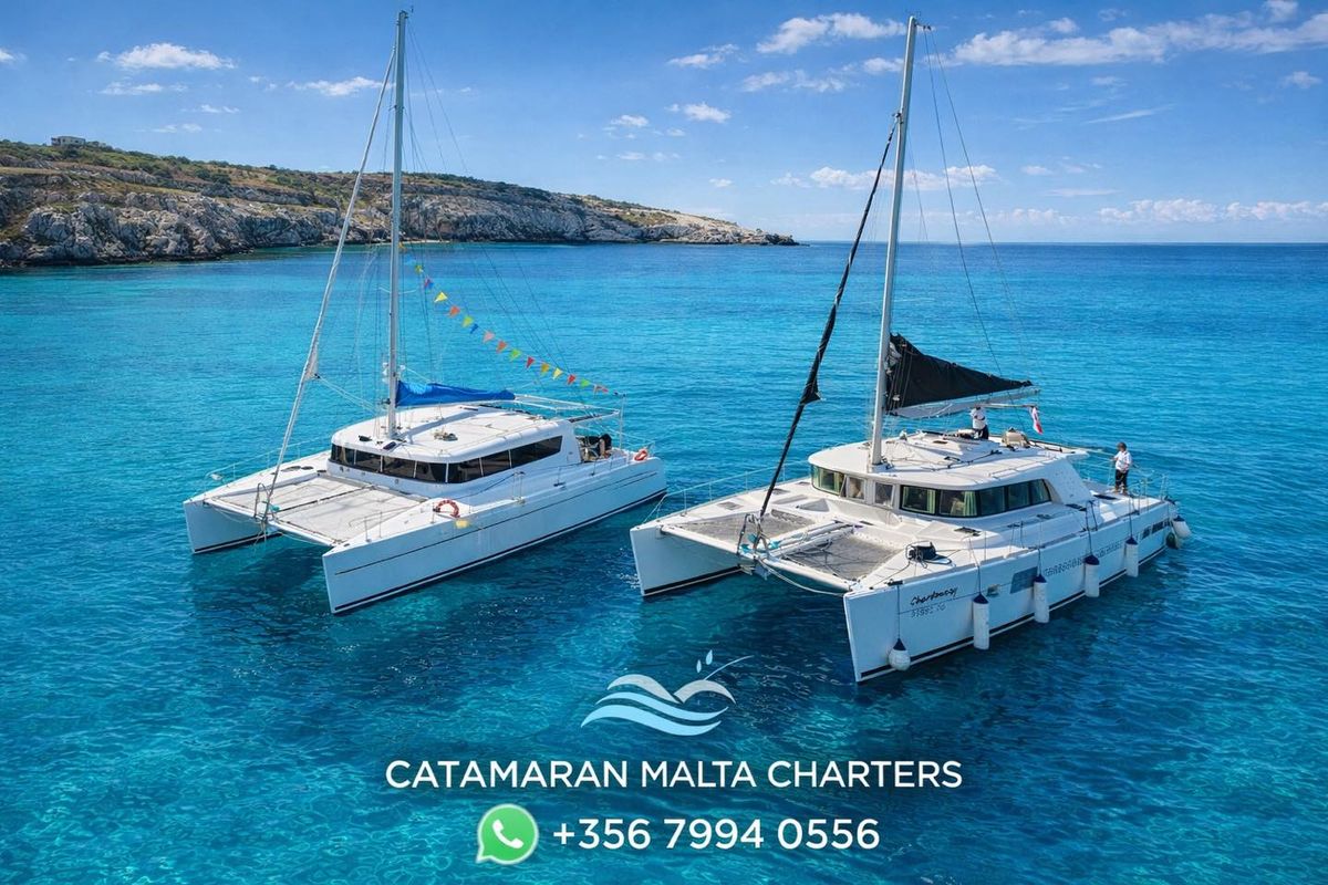 Catamarans cruising Malta coastline