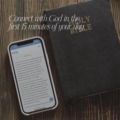 First15 devotional open next to a bible