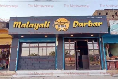 Shop name board manufacturers in Bangalore installing ACP glow sign board for retail shop