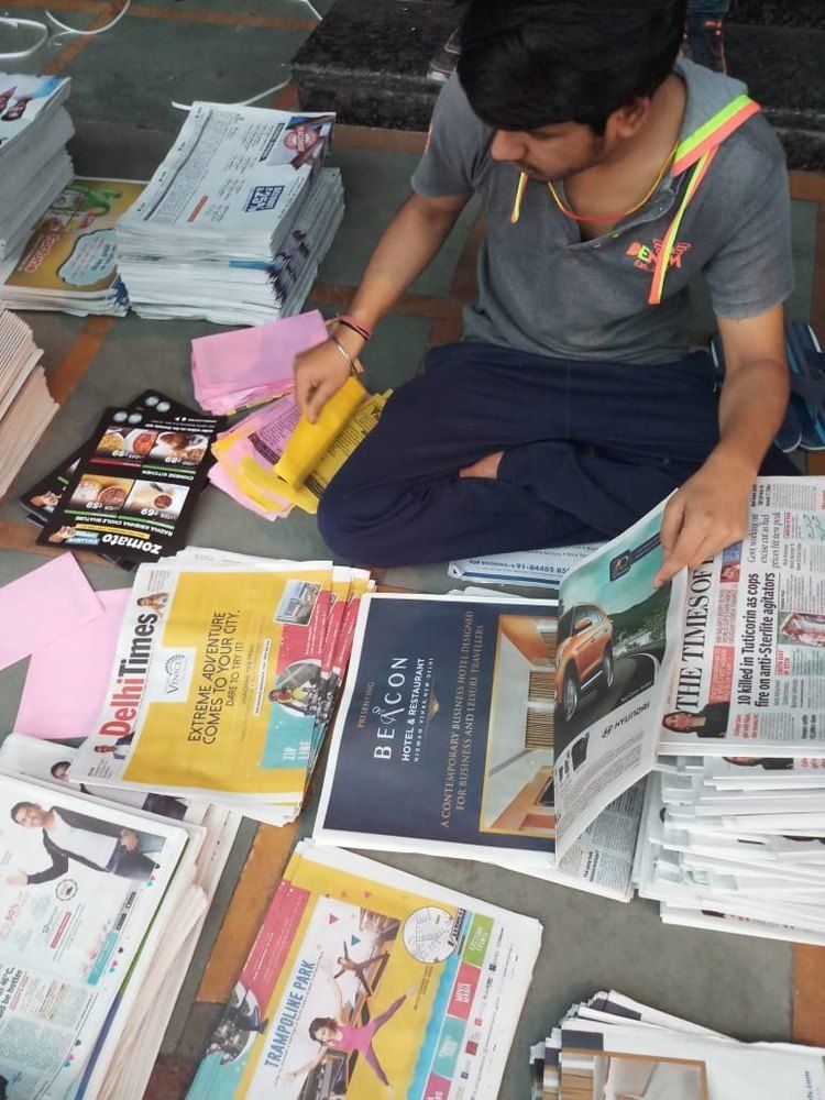 Hyderabad newspaper insertion service distributing advertising pamphlets via Telugu newspapers to reach citywide households