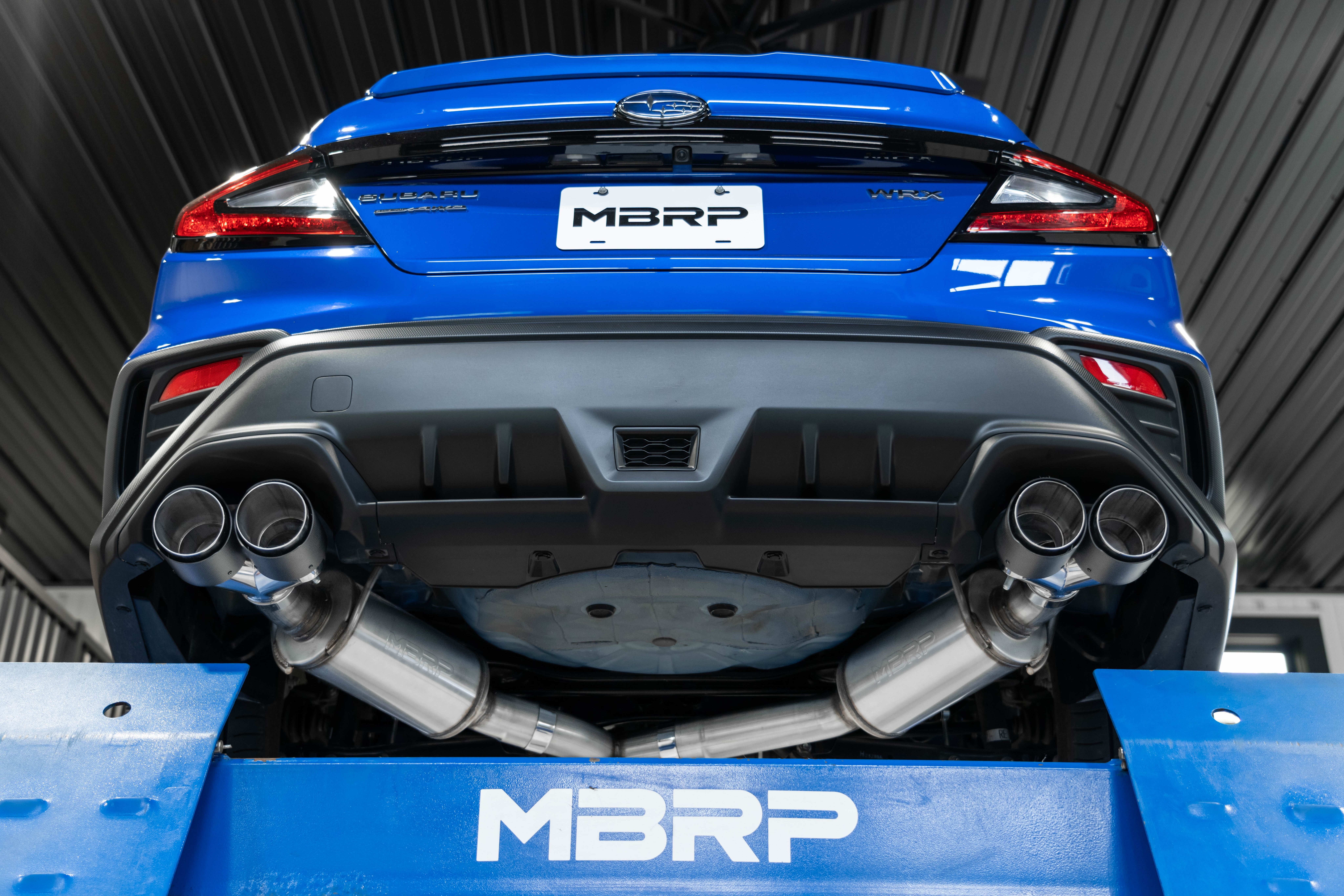 Blue Subaru WRX with mbrp exhaust kit installed