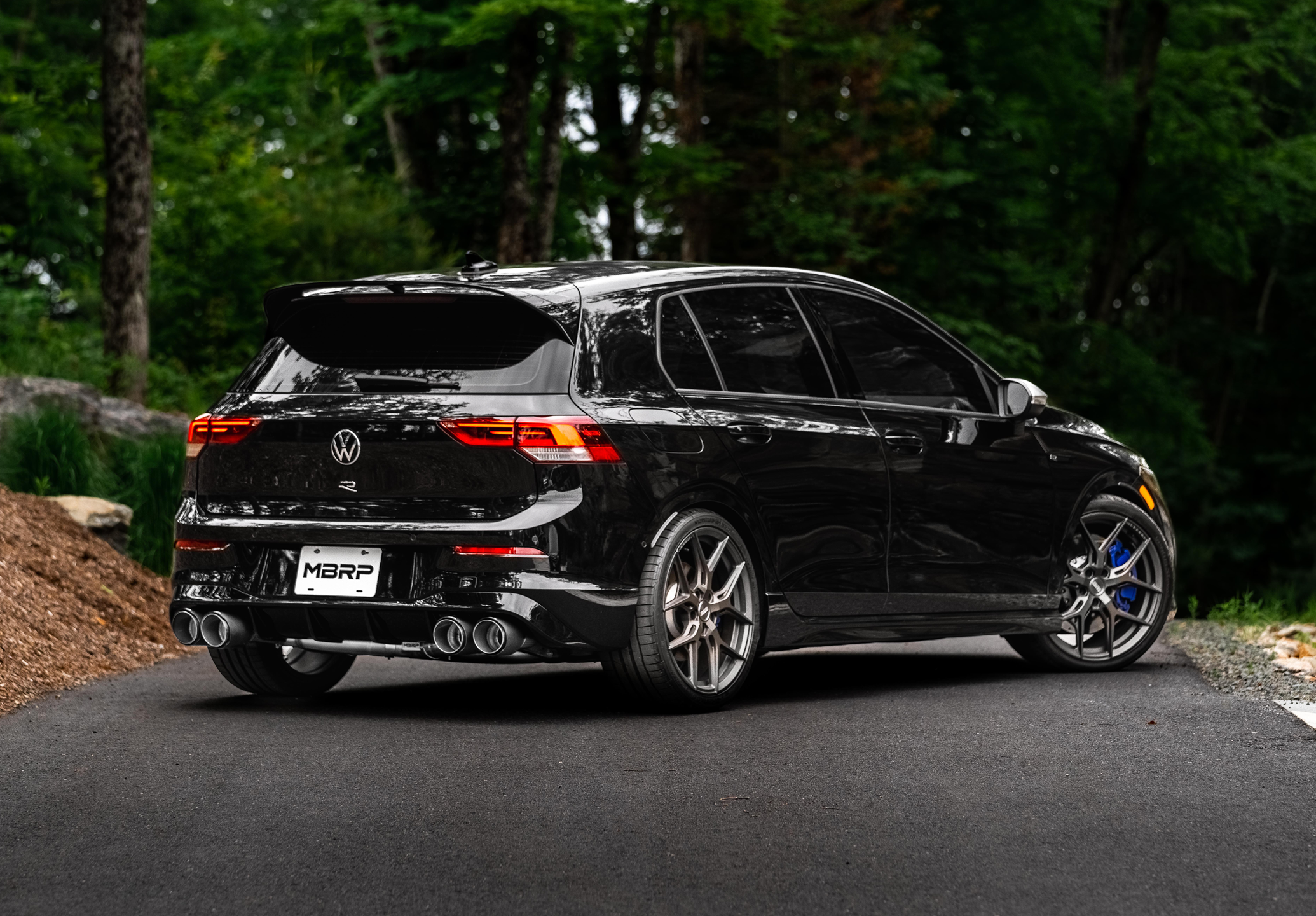 Black VW R shown on the roadway with an mbrp exhaust installed