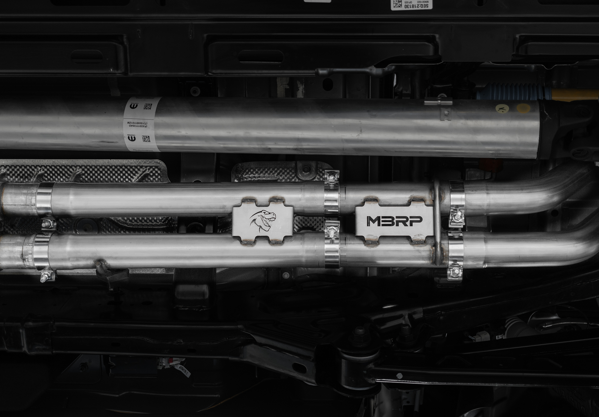 MBRP exhaust install on a Ford Raptor showing the under carriage with expert welding