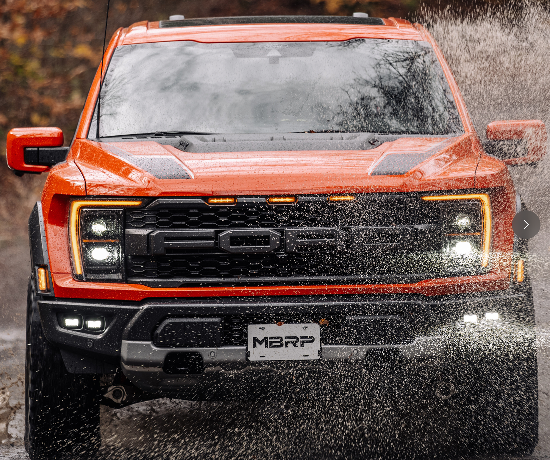 Ford Raptor going through a puddle