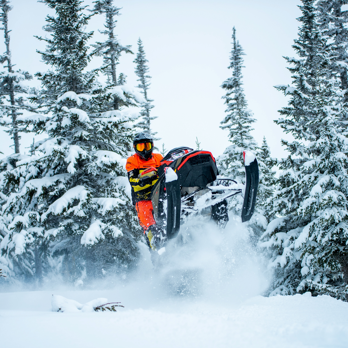 Snowmobile doing a jump