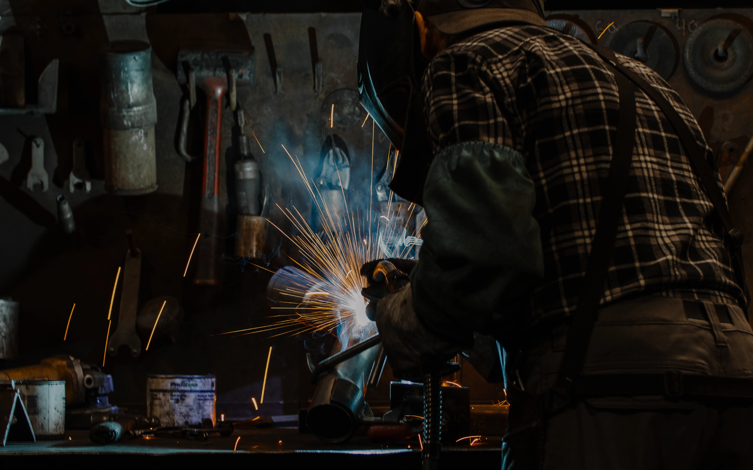 Expert Welder working on an MBRP exhaust