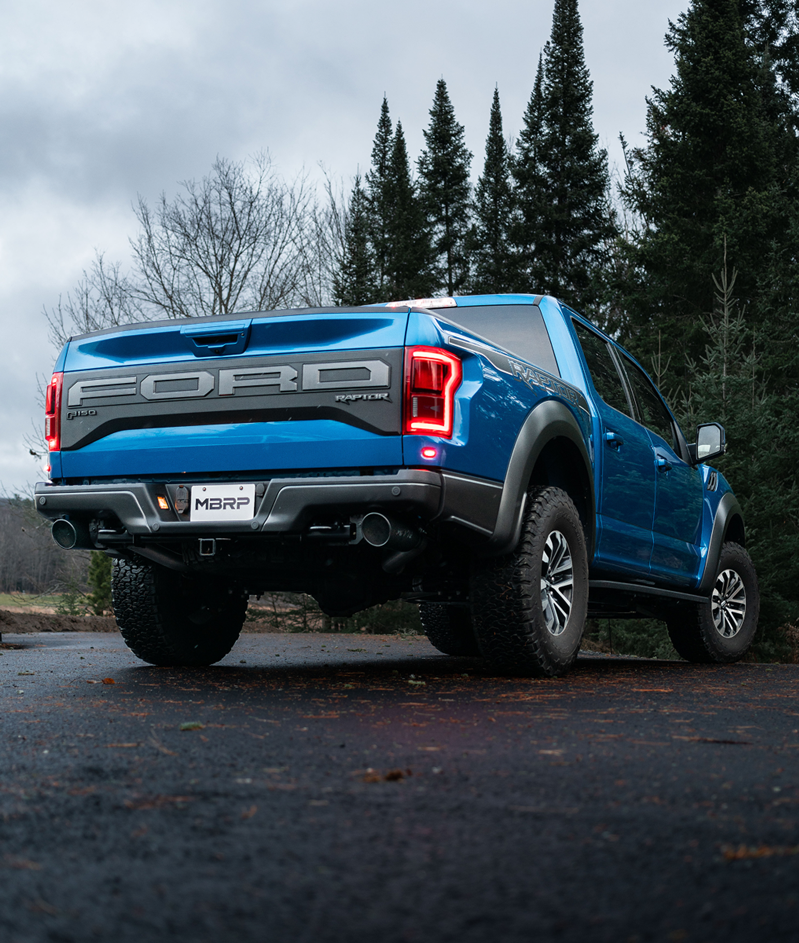 Ford F-150 Raptor in blue with an mbrp exhaust