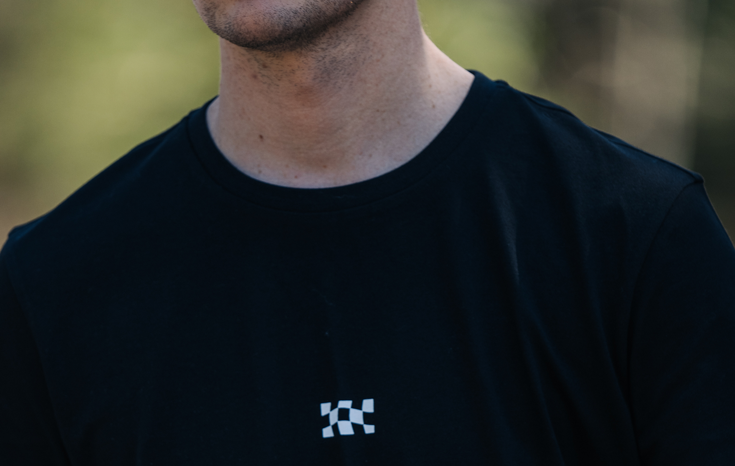 MBRP merch, black tee with checkerboard pattern