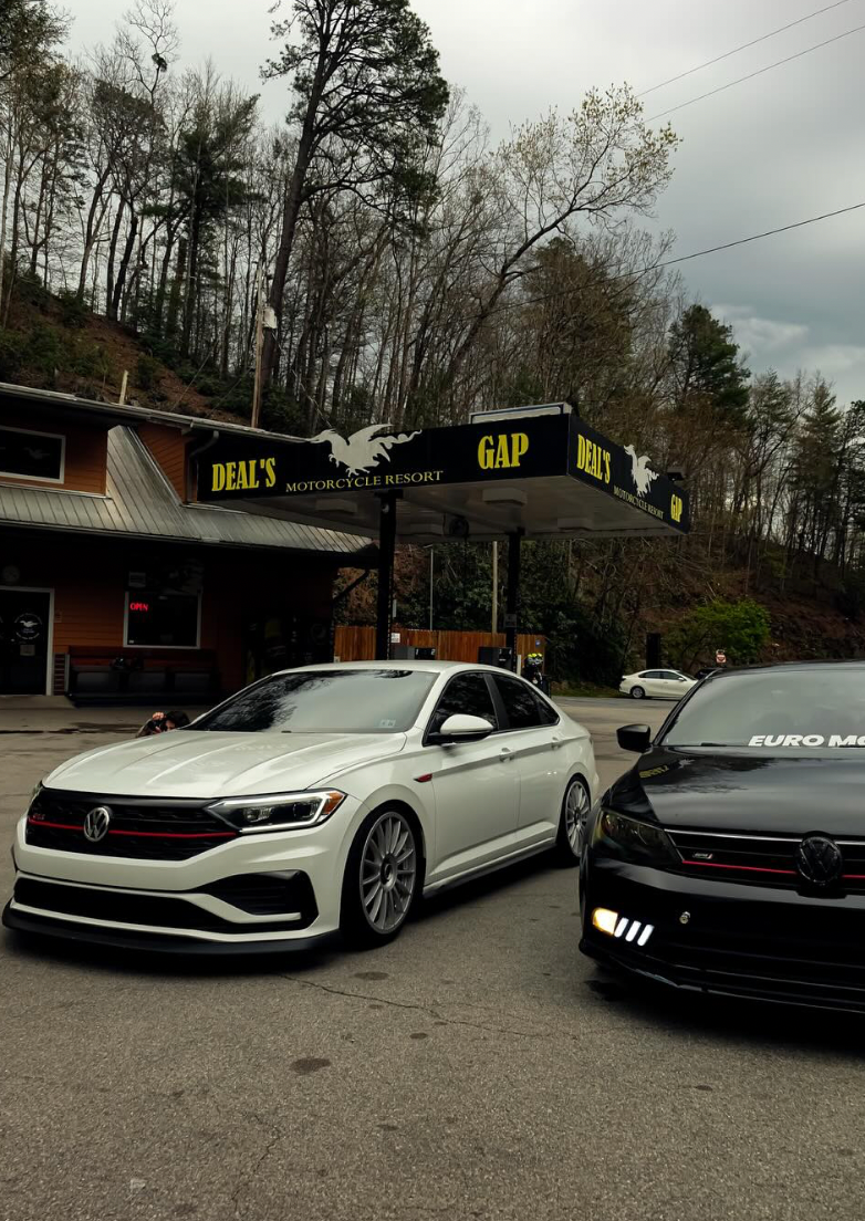 White and black VW with mbrp exhaust installed, customer image
