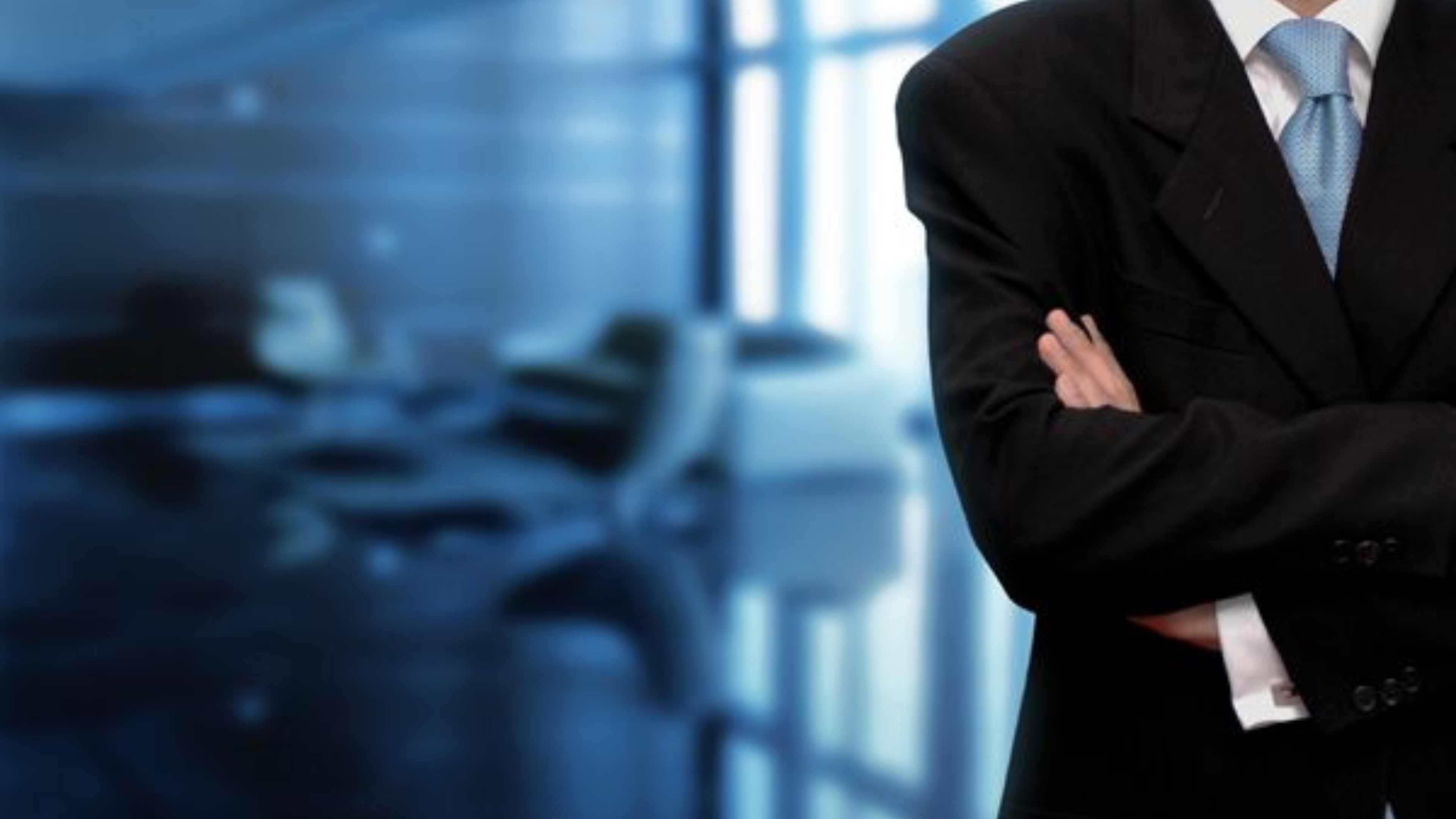 Business consultant reviewing Abu Dhabi Chamber of Commerce documents with a client