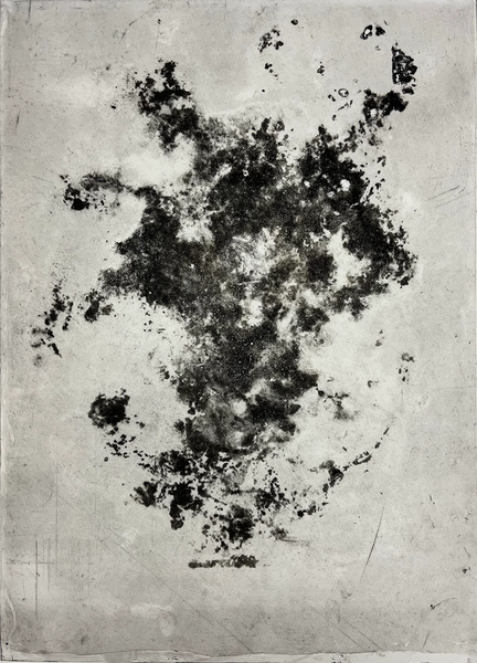 A grey metal plate with the same abstract, organic-looking, brownish motif imprinted on it