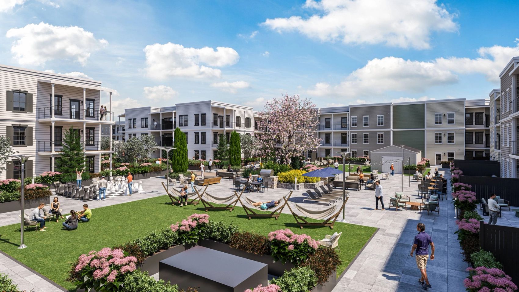 The outdoor courtyard is your backyard escape — with hammocks for lounging, cornhole for friendly games, and casual seating perfect for catching up or kicking back.