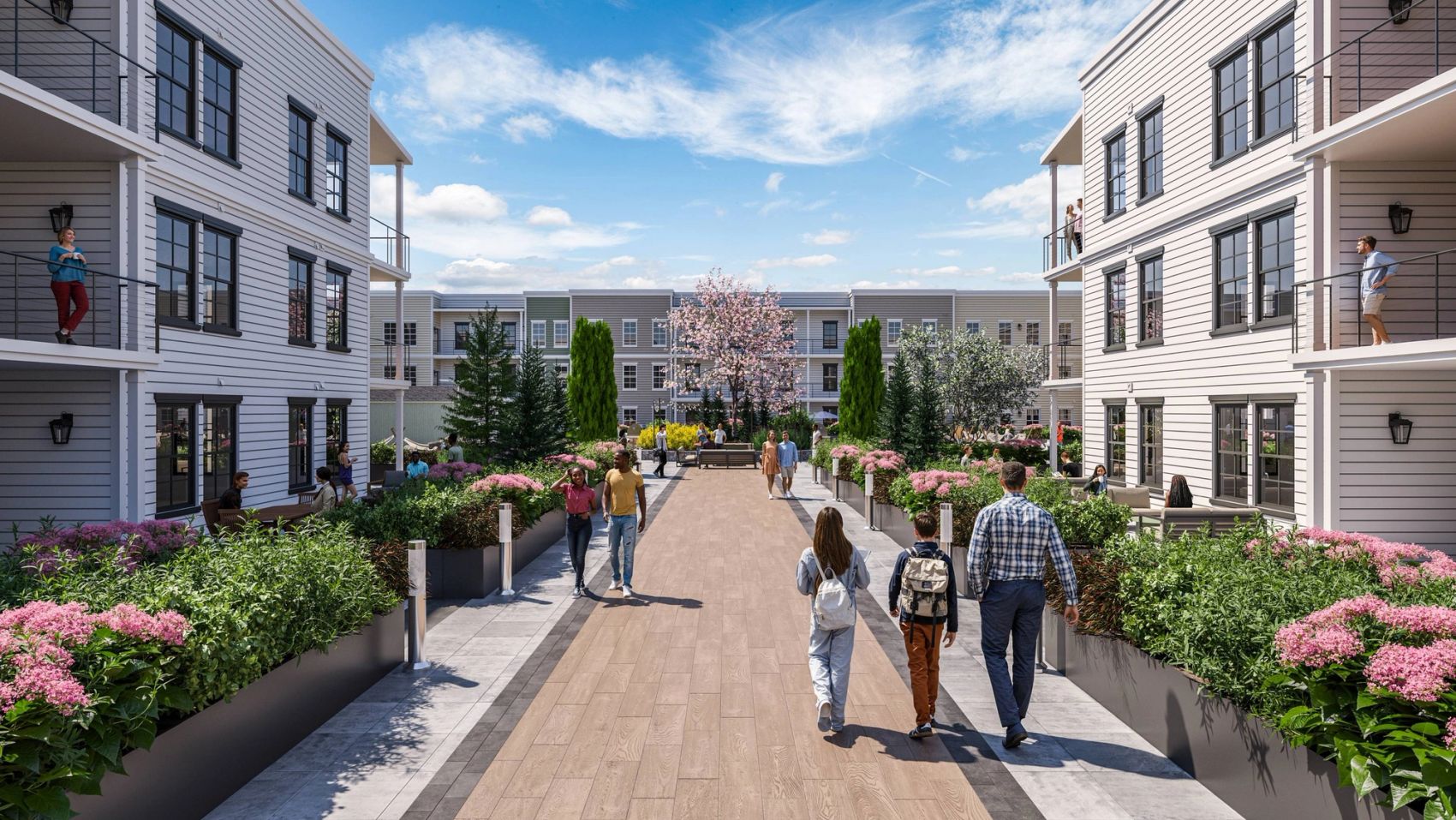 A peaceful walkway that winds through the courtyard, connecting green spaces and lounge areas in a beautifully landscaped setting.