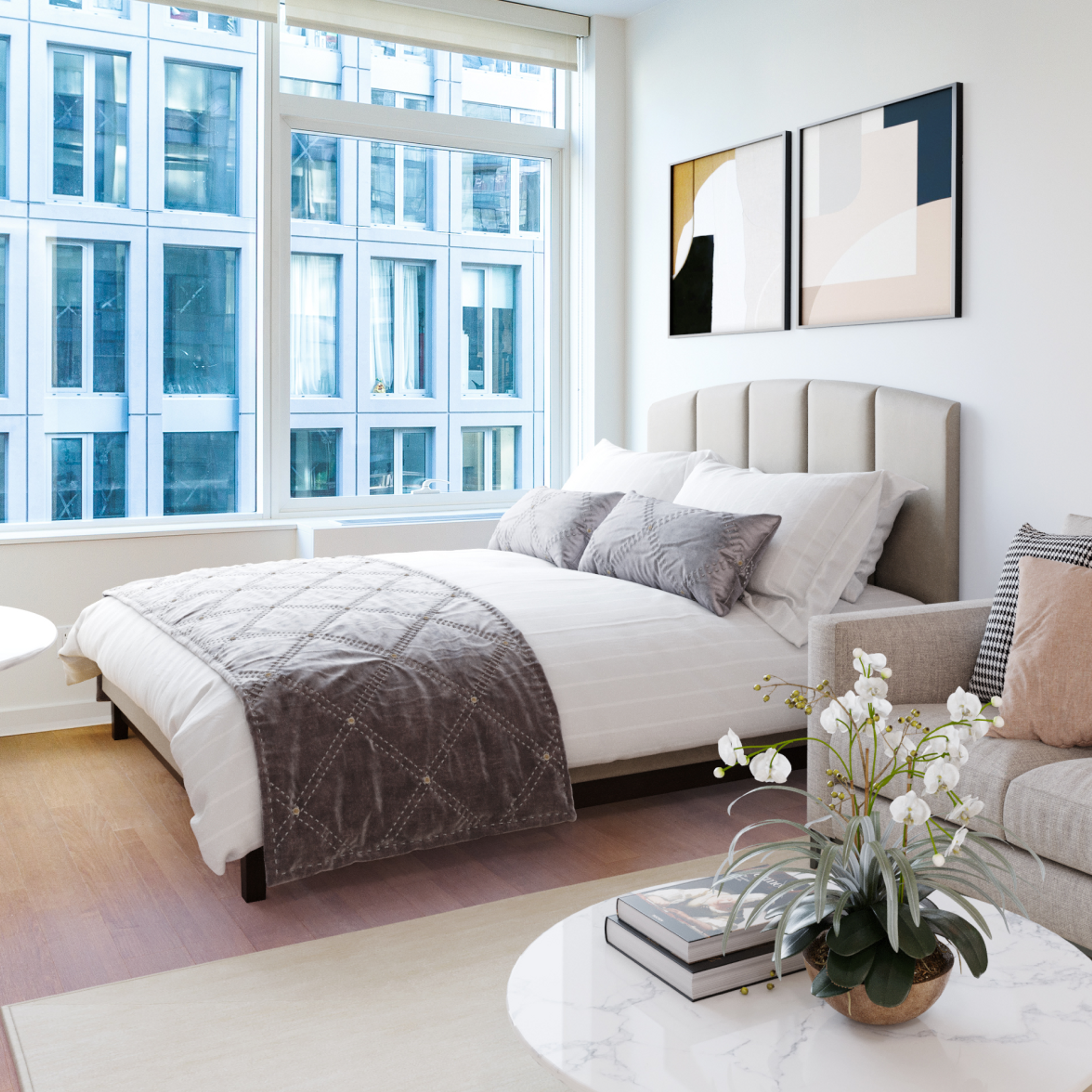 Queen bed with large windows and view of city