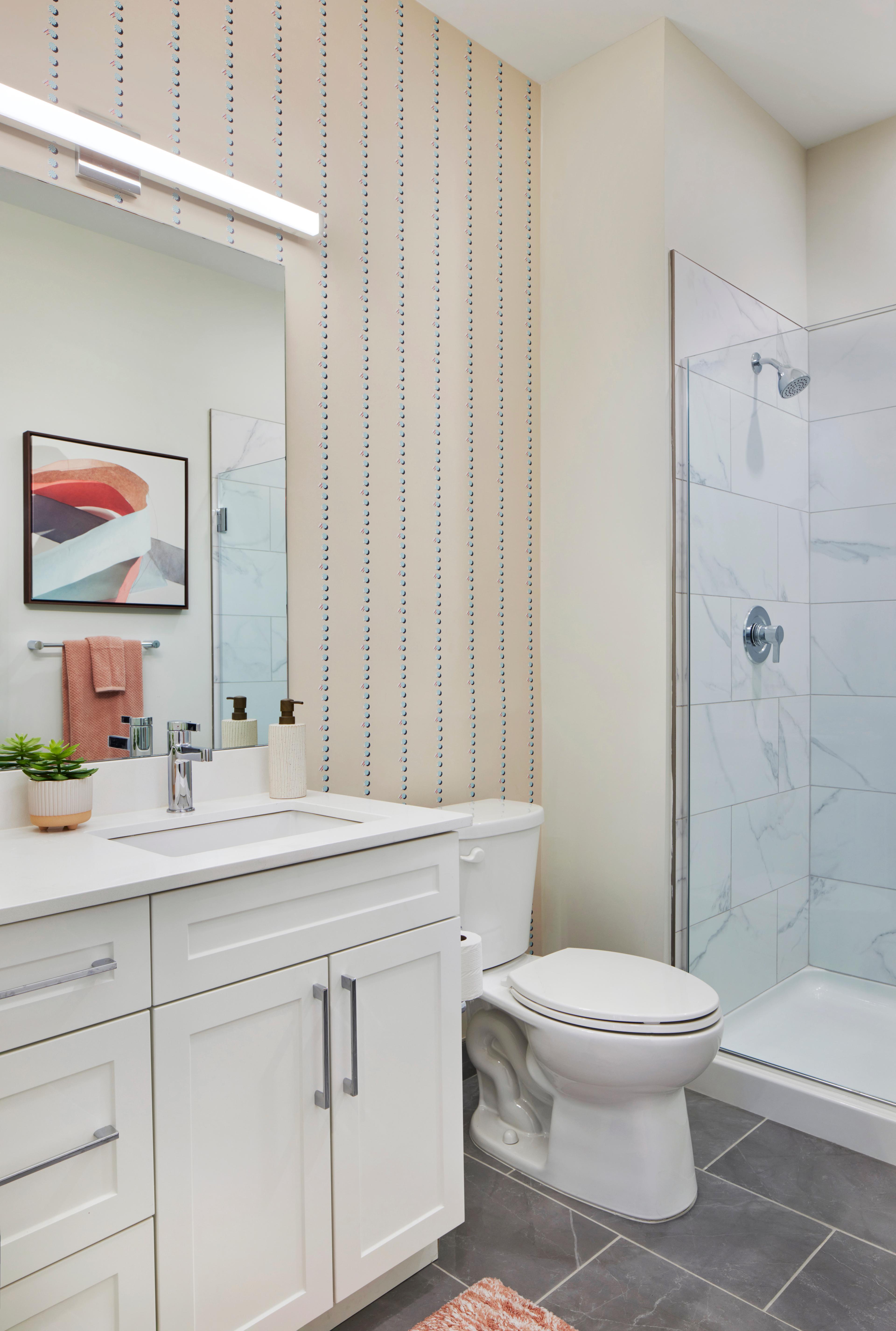 Bathroom with stand up shower with sliding doors